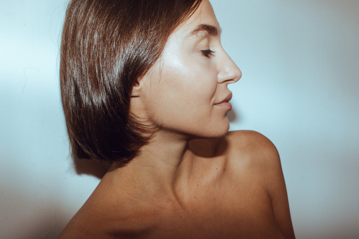 Older woman with tight neck skin shows possible results of a neck lift in McKinney