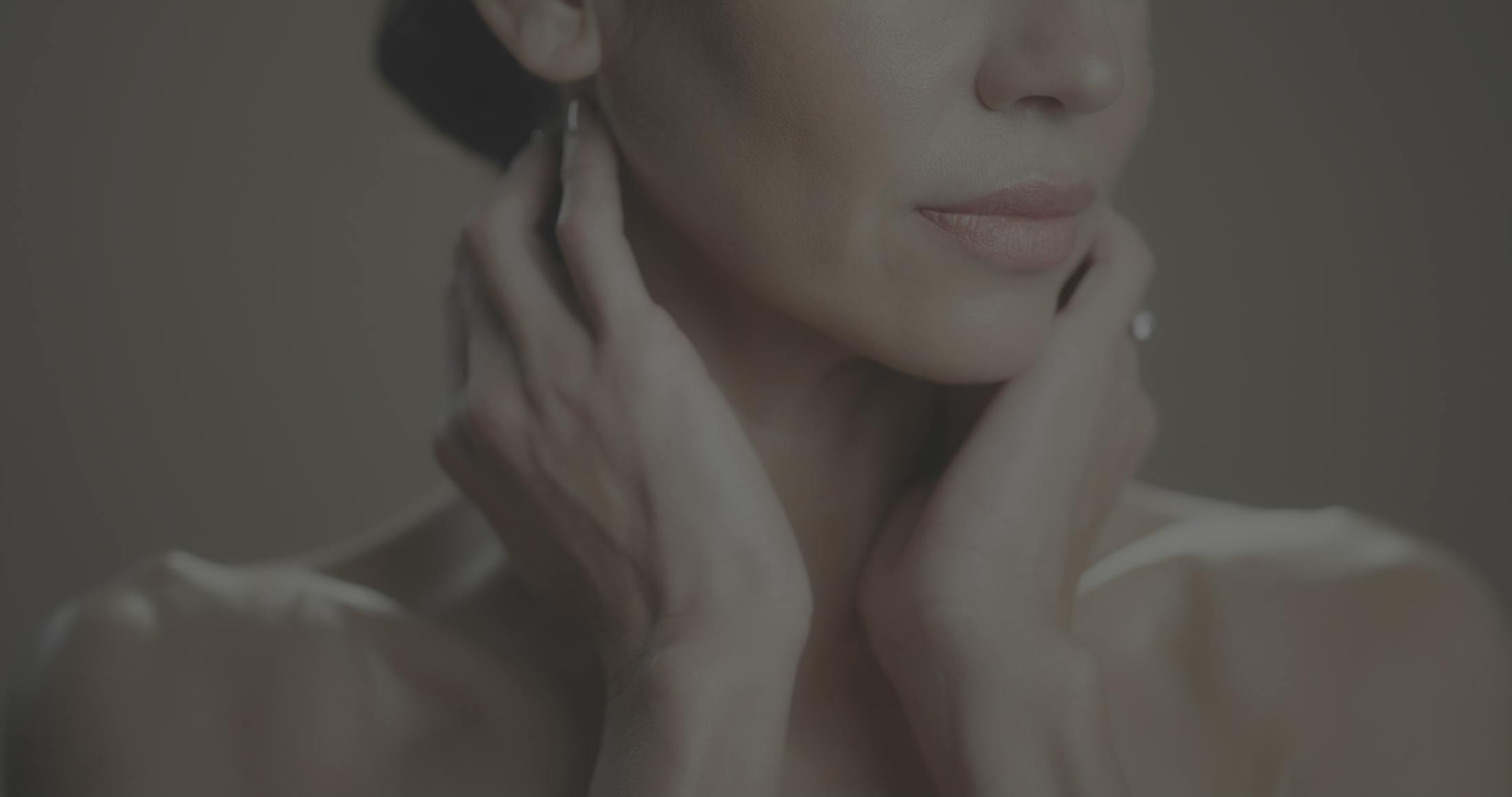 Woman with tight neck skin shows possible results of a neck lift in McKinney