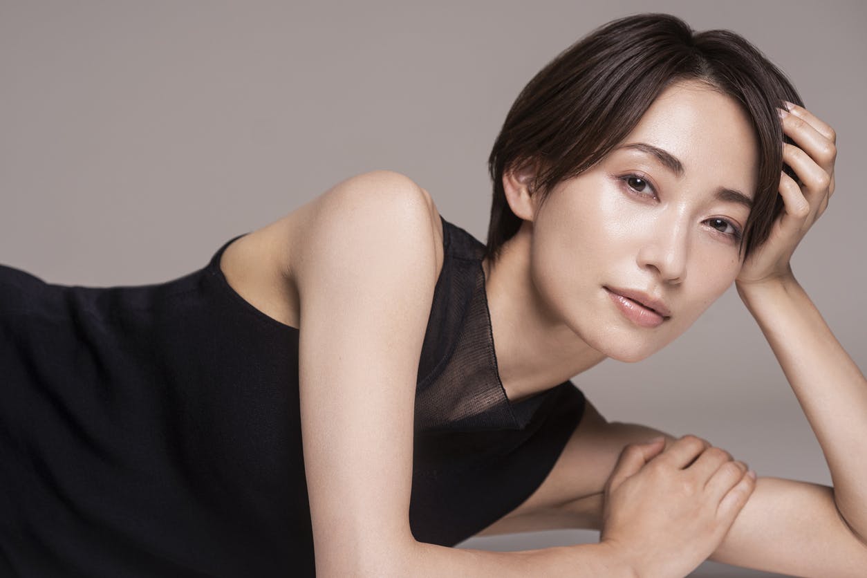 Beautiful older Asian woman in studio shoot
