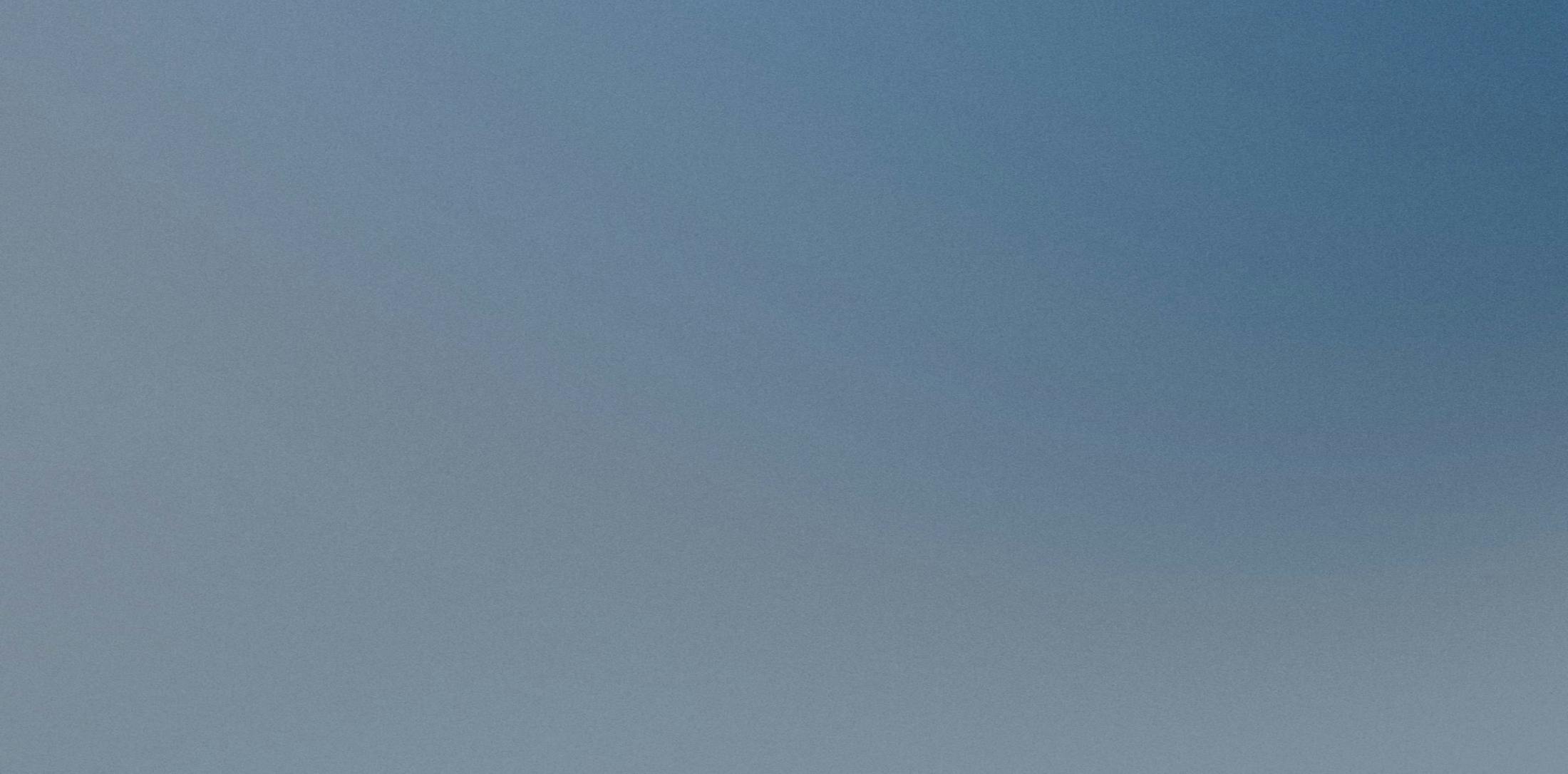 Faded blue background