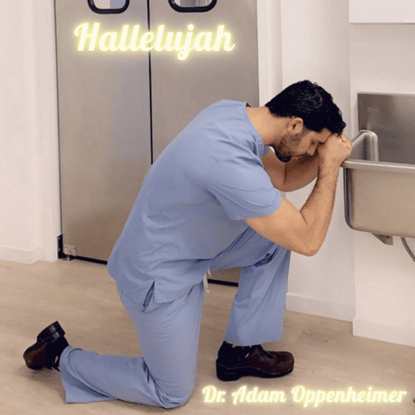 Dr. Oppenheimer kneeling