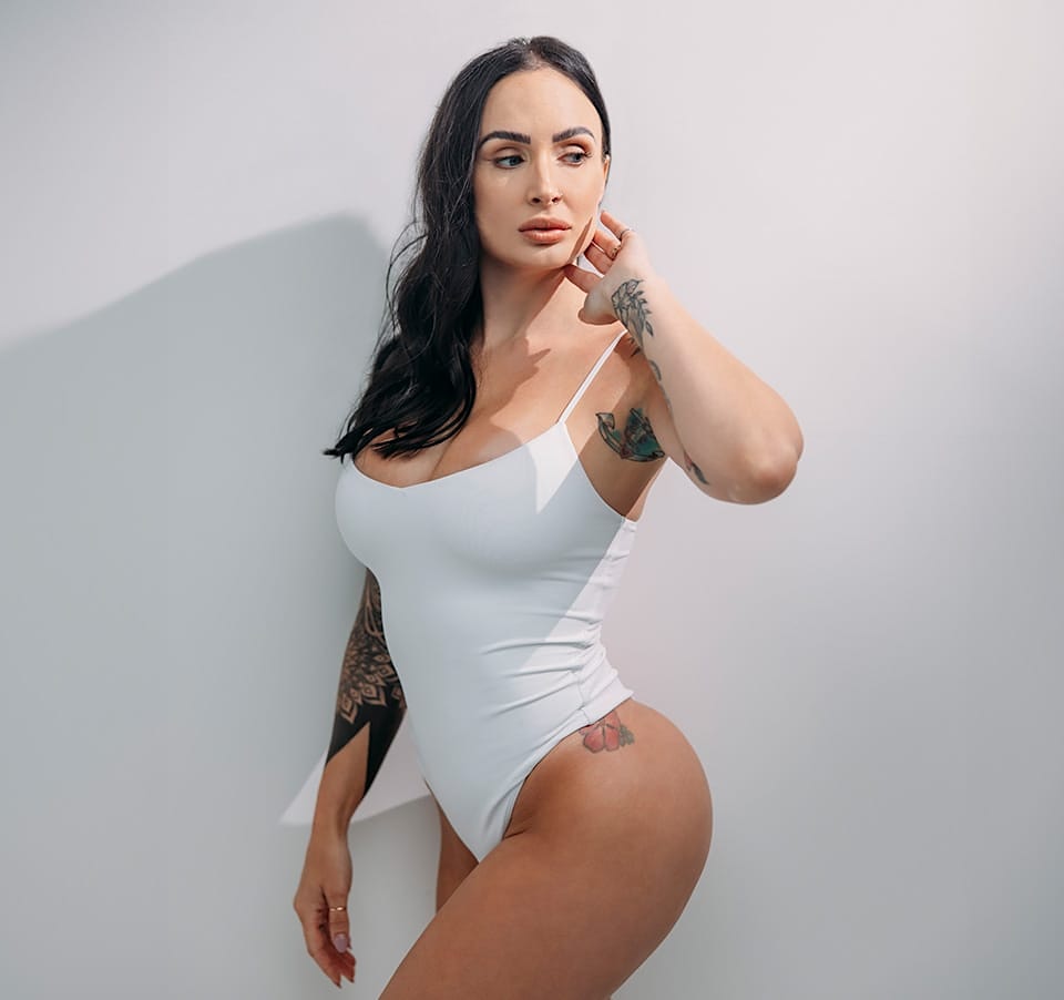 Woman wearing white leotard