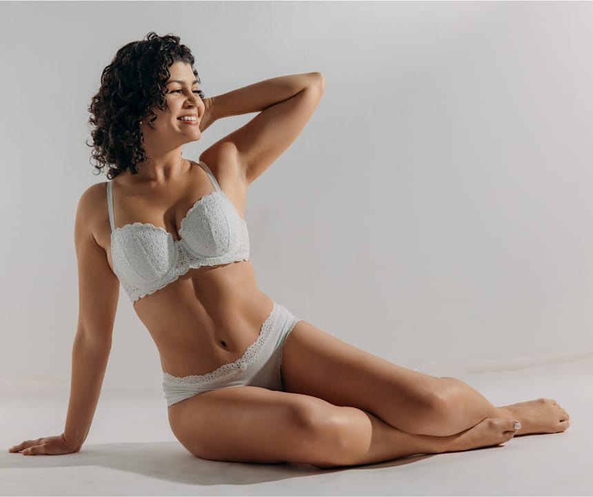 woman in white lacey undergarments