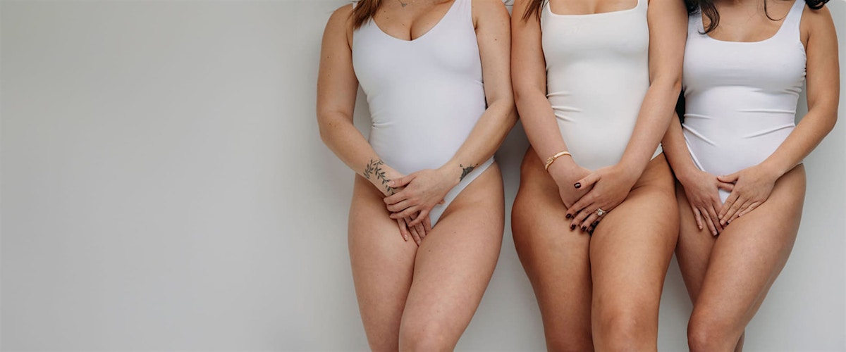 Woman posing in tan underwear