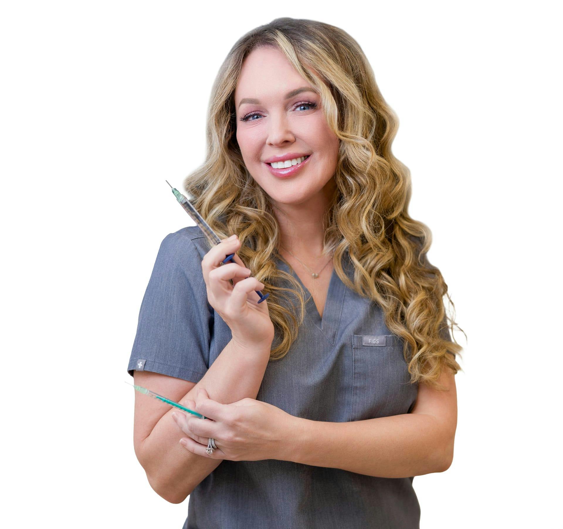Sarah holding an injection