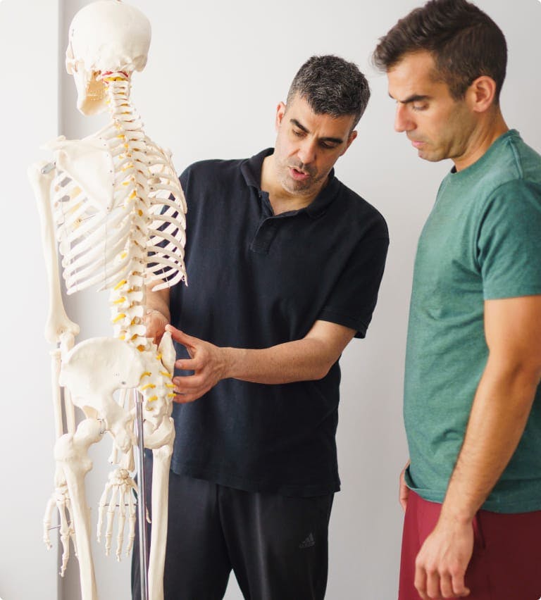 Two men with a skeleton