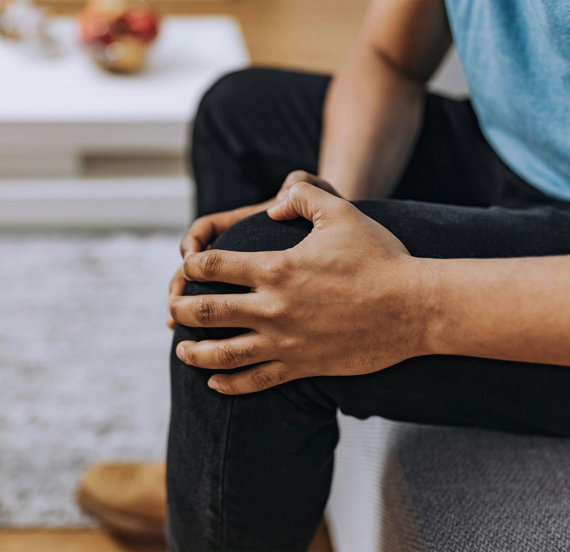 person holding their knee