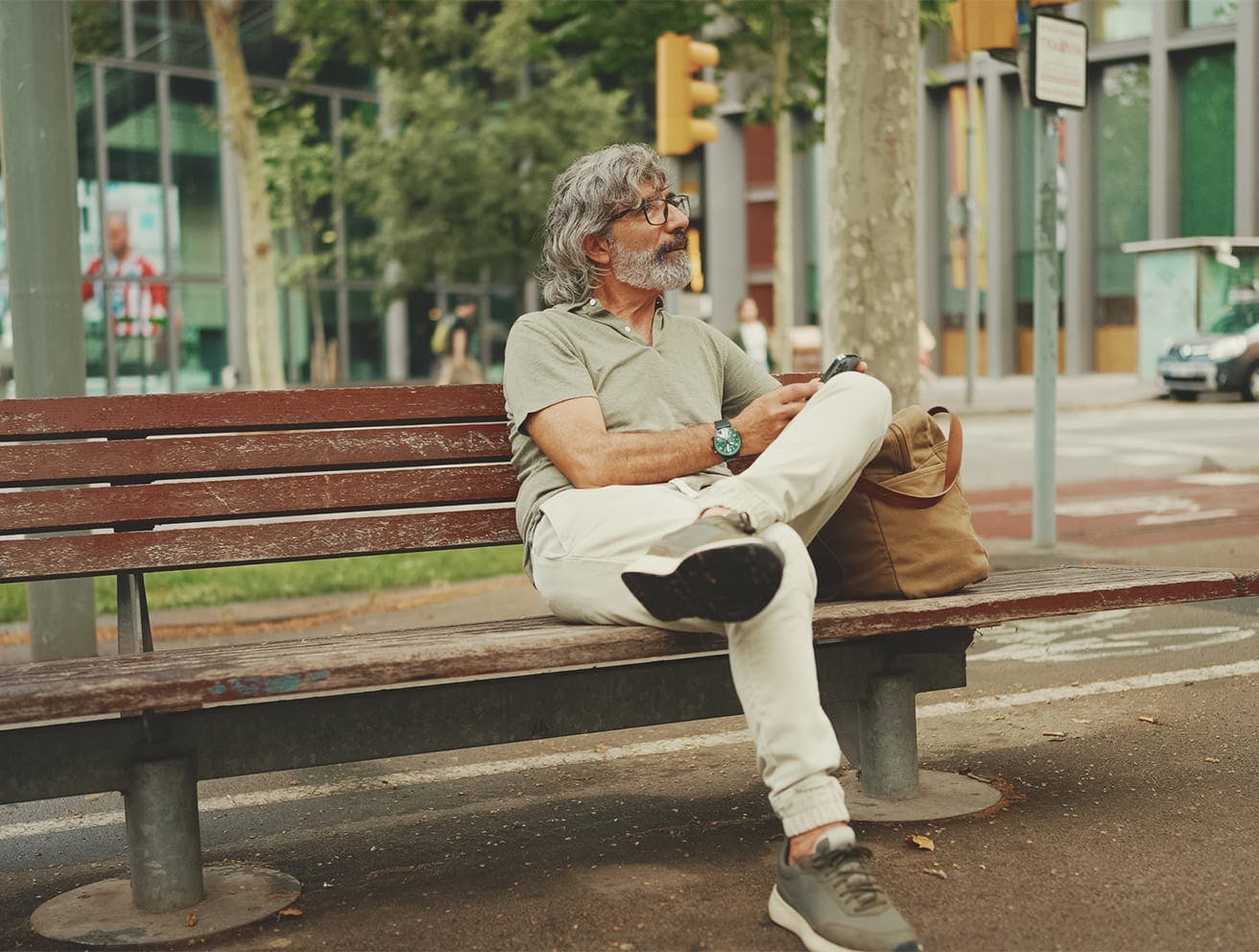 older man sitting on a bench