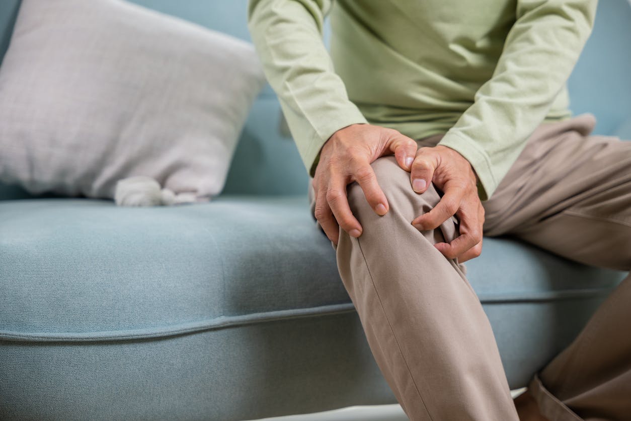 someone holding their knee