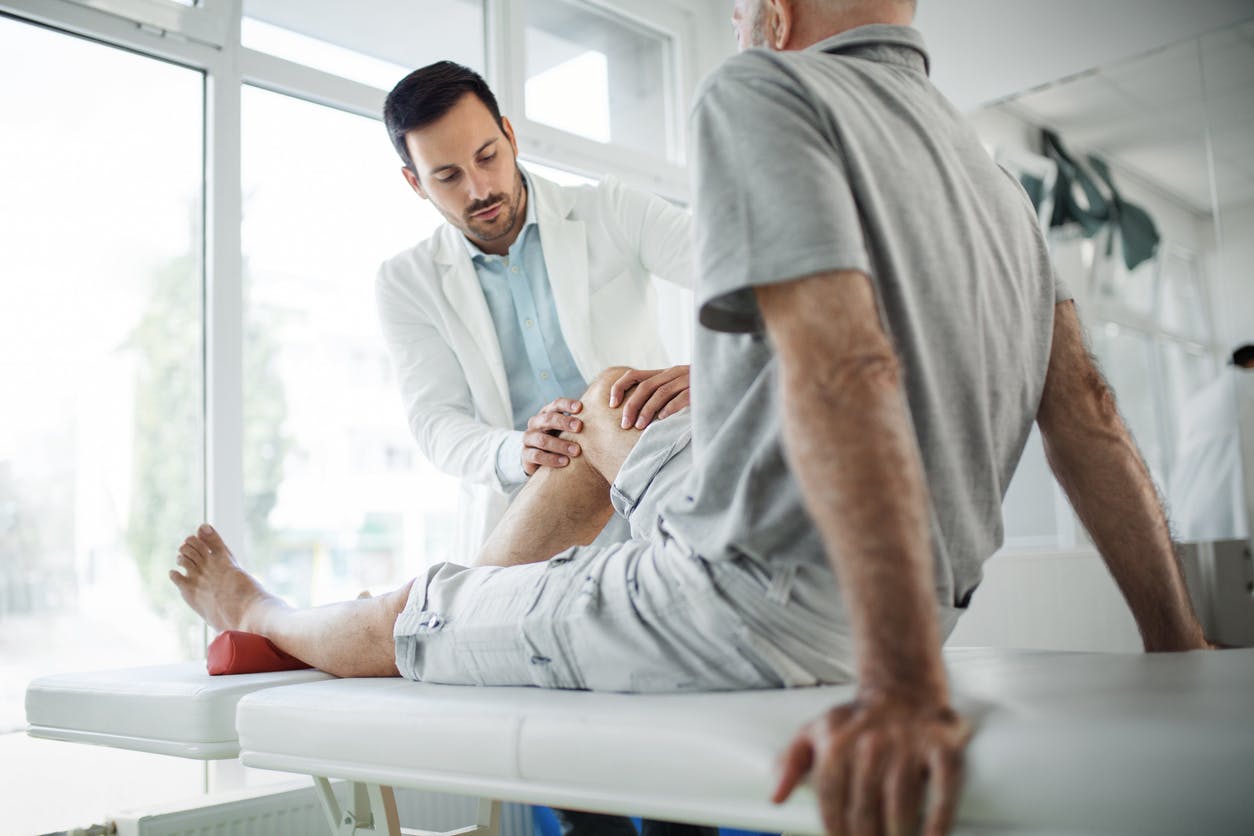 man giving physical therpay