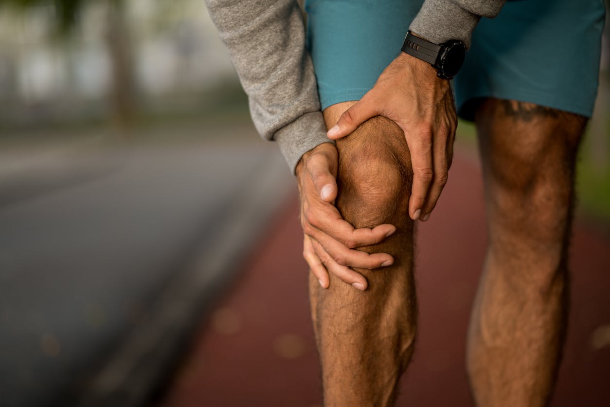 person holding their knee