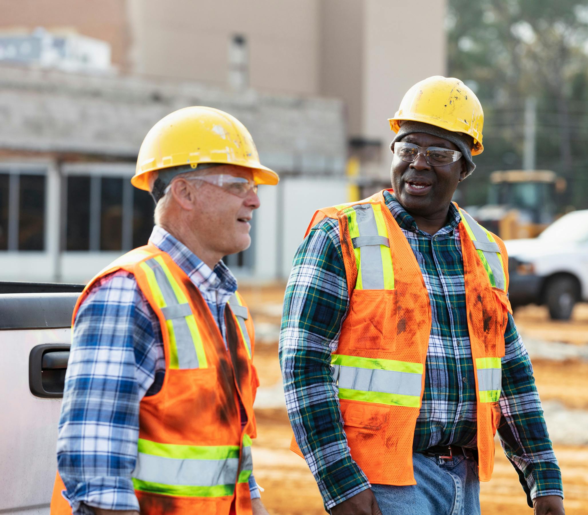construction workers speaking to eachother