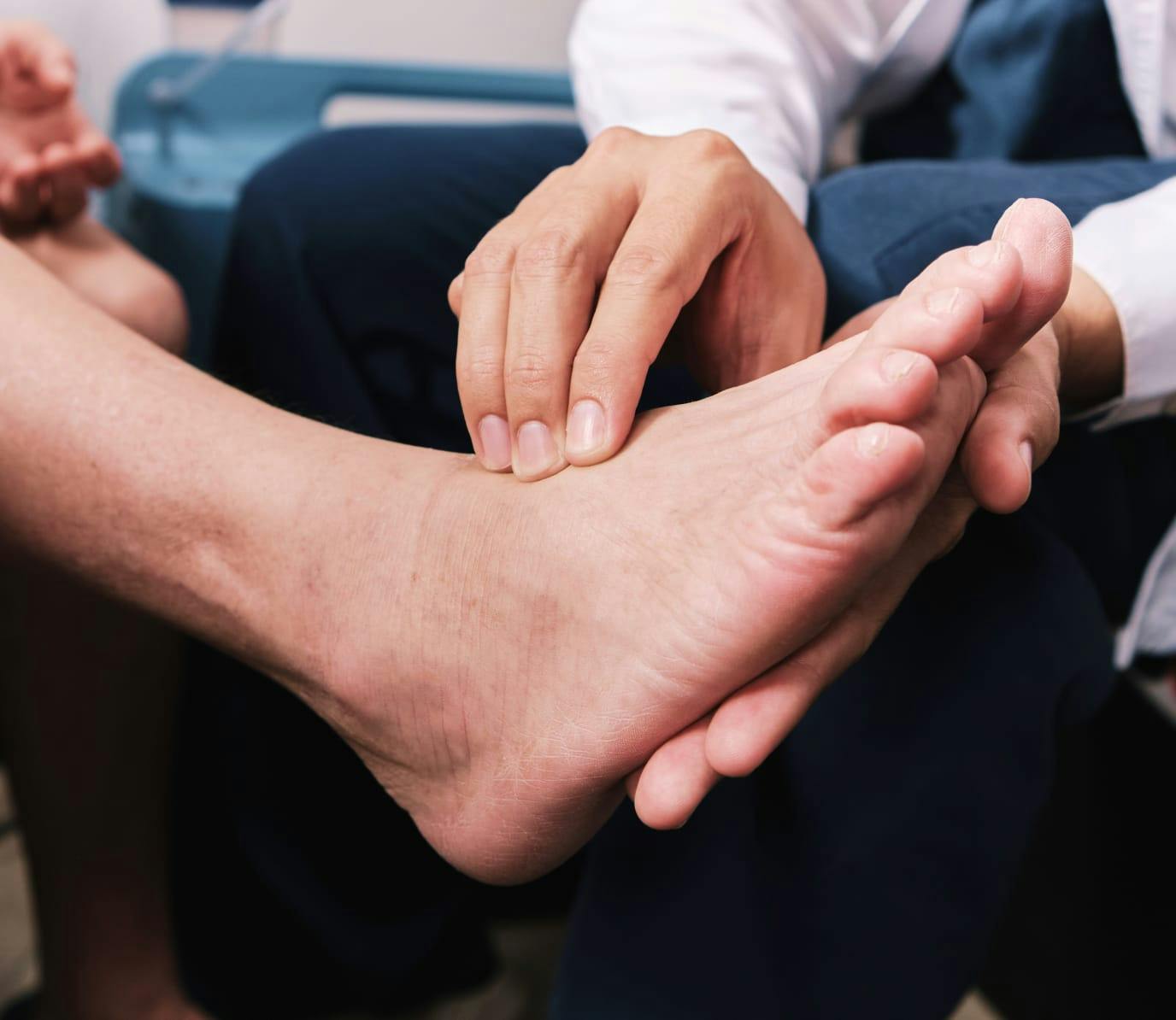 Doctor examining a patient's foot