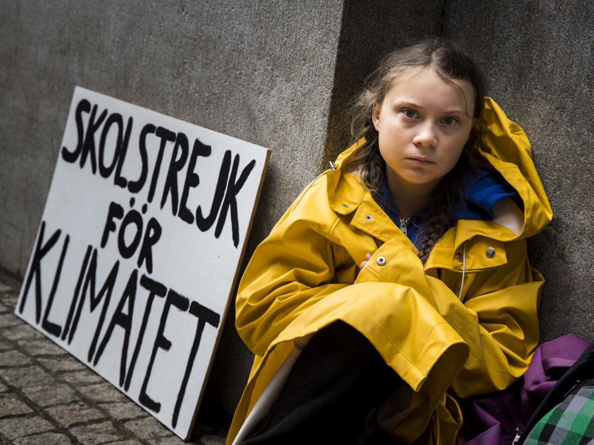 Greta Thunberg sits outside Swedish parliament in August 2018