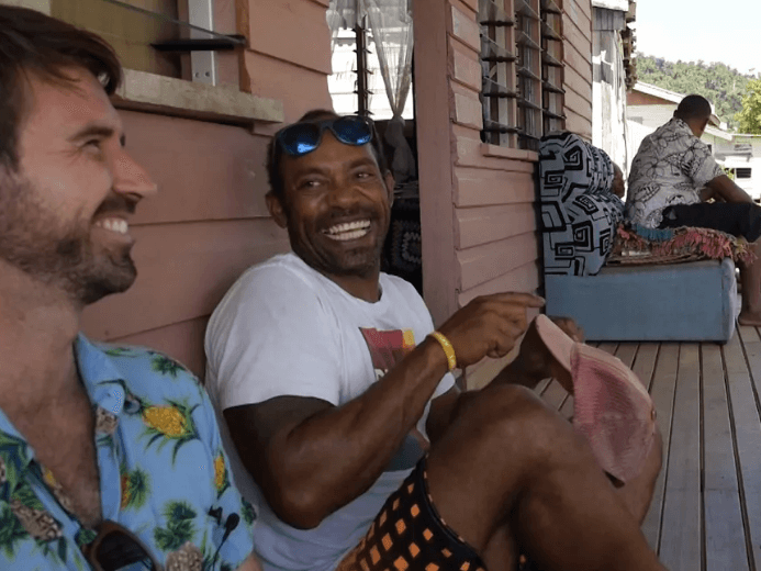 Image of 2 men involved with Climates sitting down and laughing