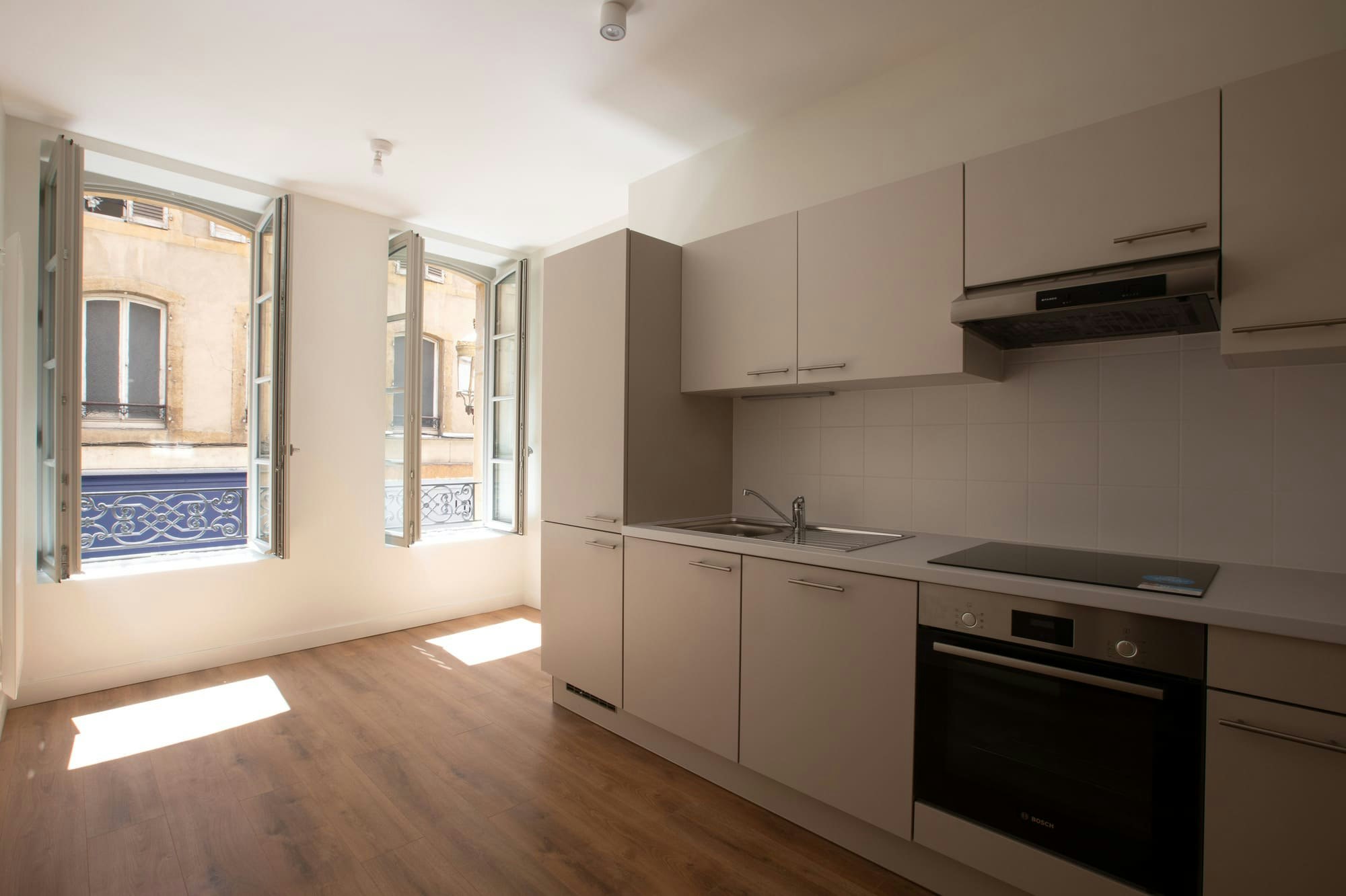 indoors, interior design, floor, microwave, oven, kitchen, flooring, wood, cooktop, corner