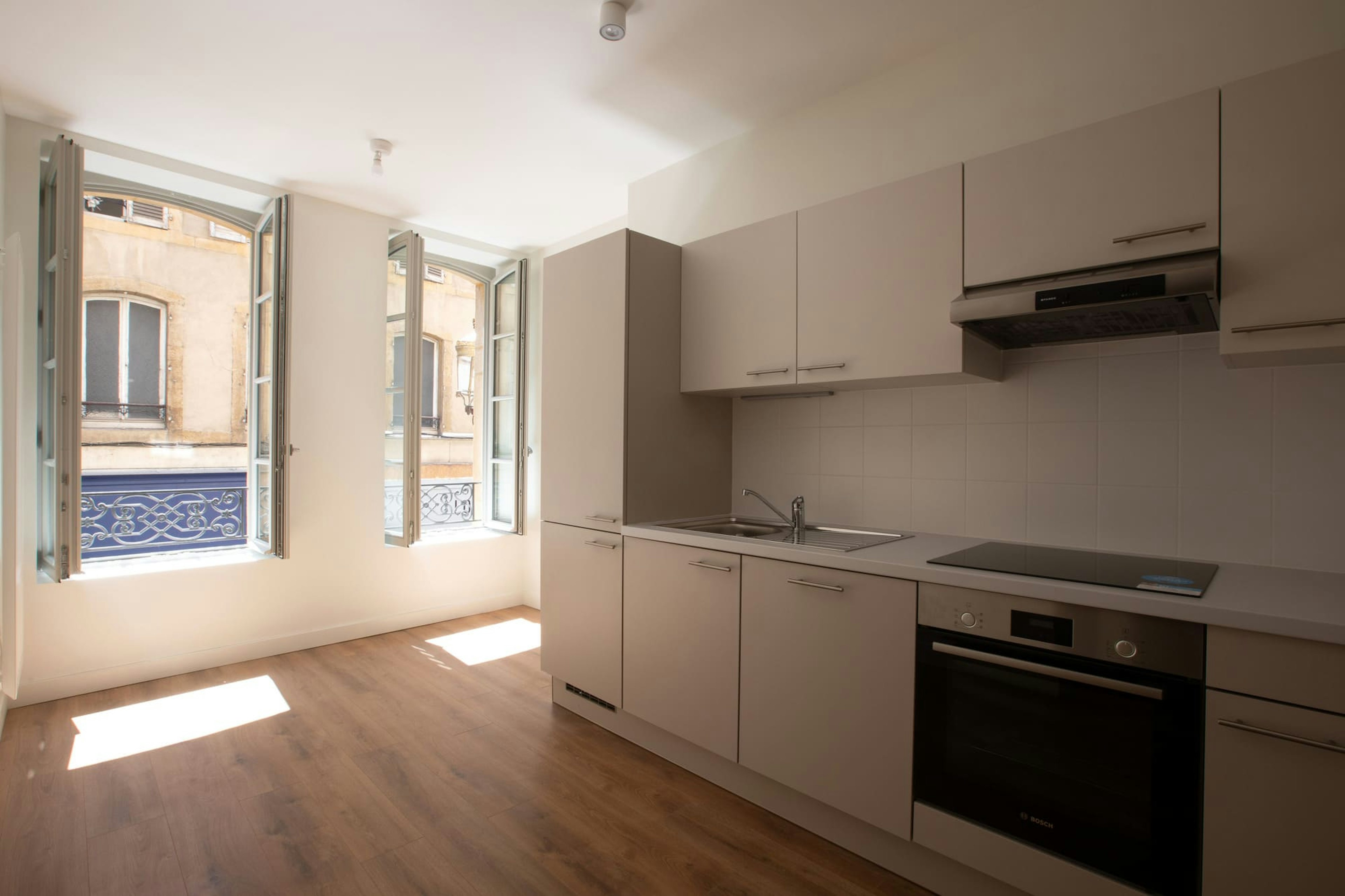 indoors, interior design, floor, microwave, oven, kitchen, flooring, wood, cooktop, corner