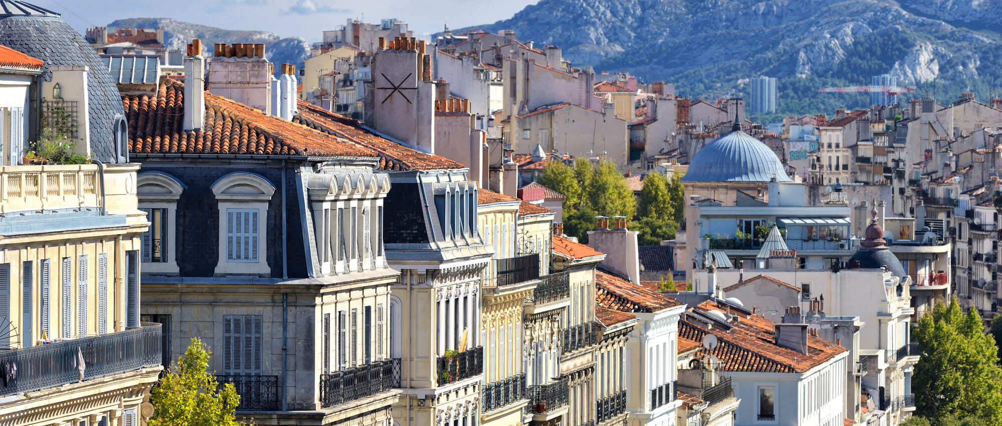 building, cityscape, urban, city, neighborhood, outdoors, scenery, housing, roof, metropolis