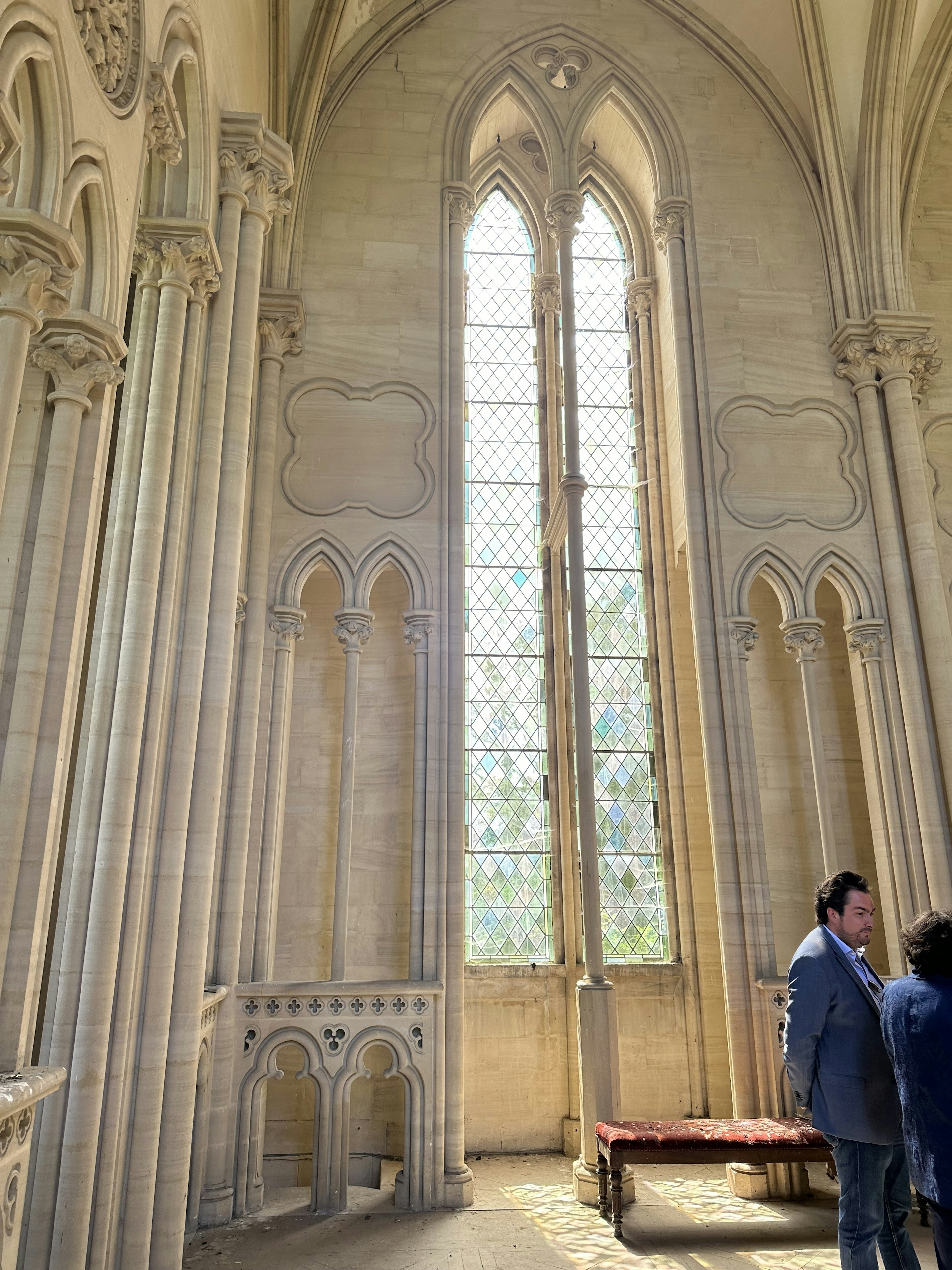 building, adult, male, man, person, bench, arch, coat, indoors, cathedral