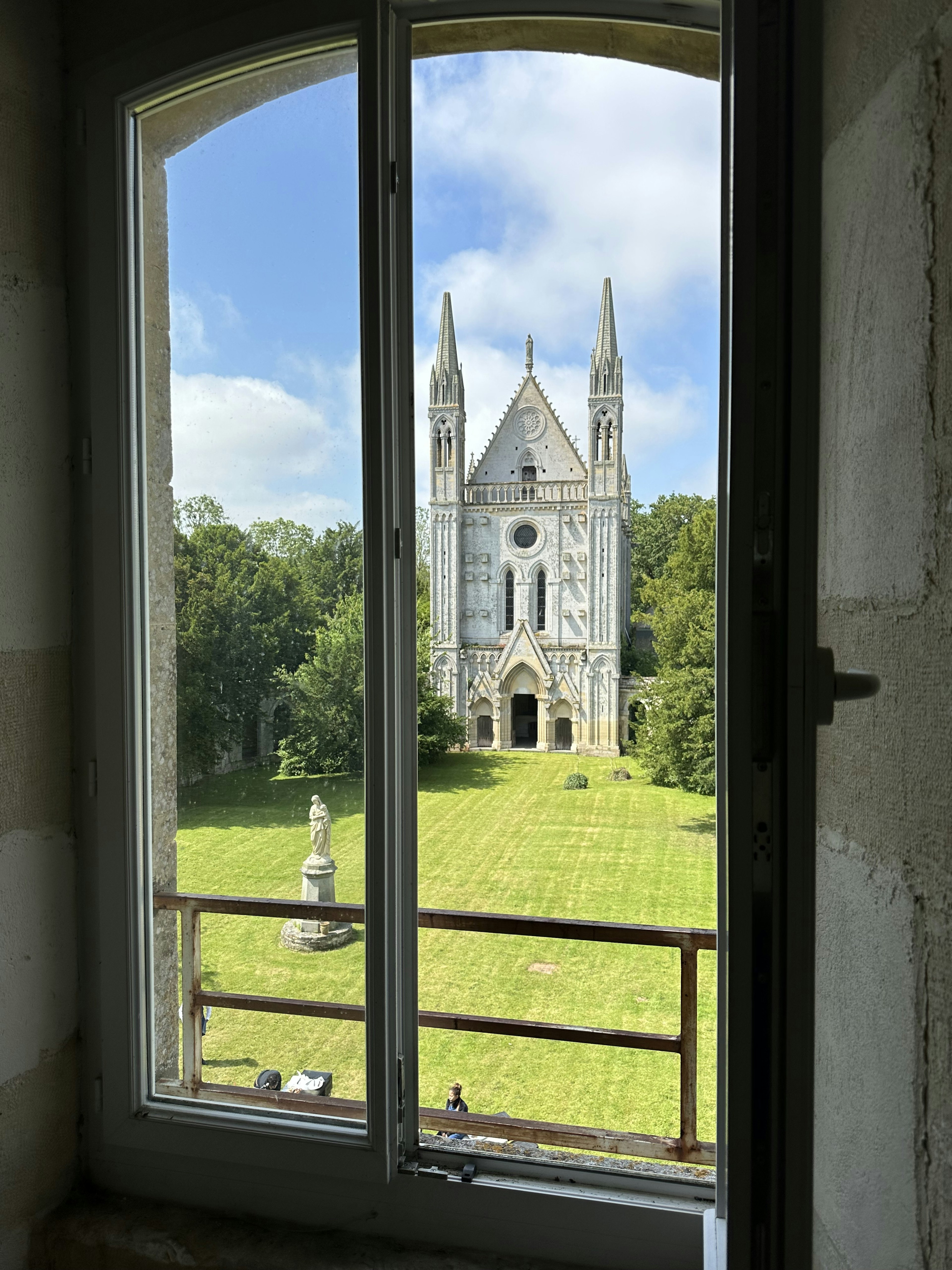 architecture, building, spire, tower, monastery, arch, gothic arch, window, person, grass