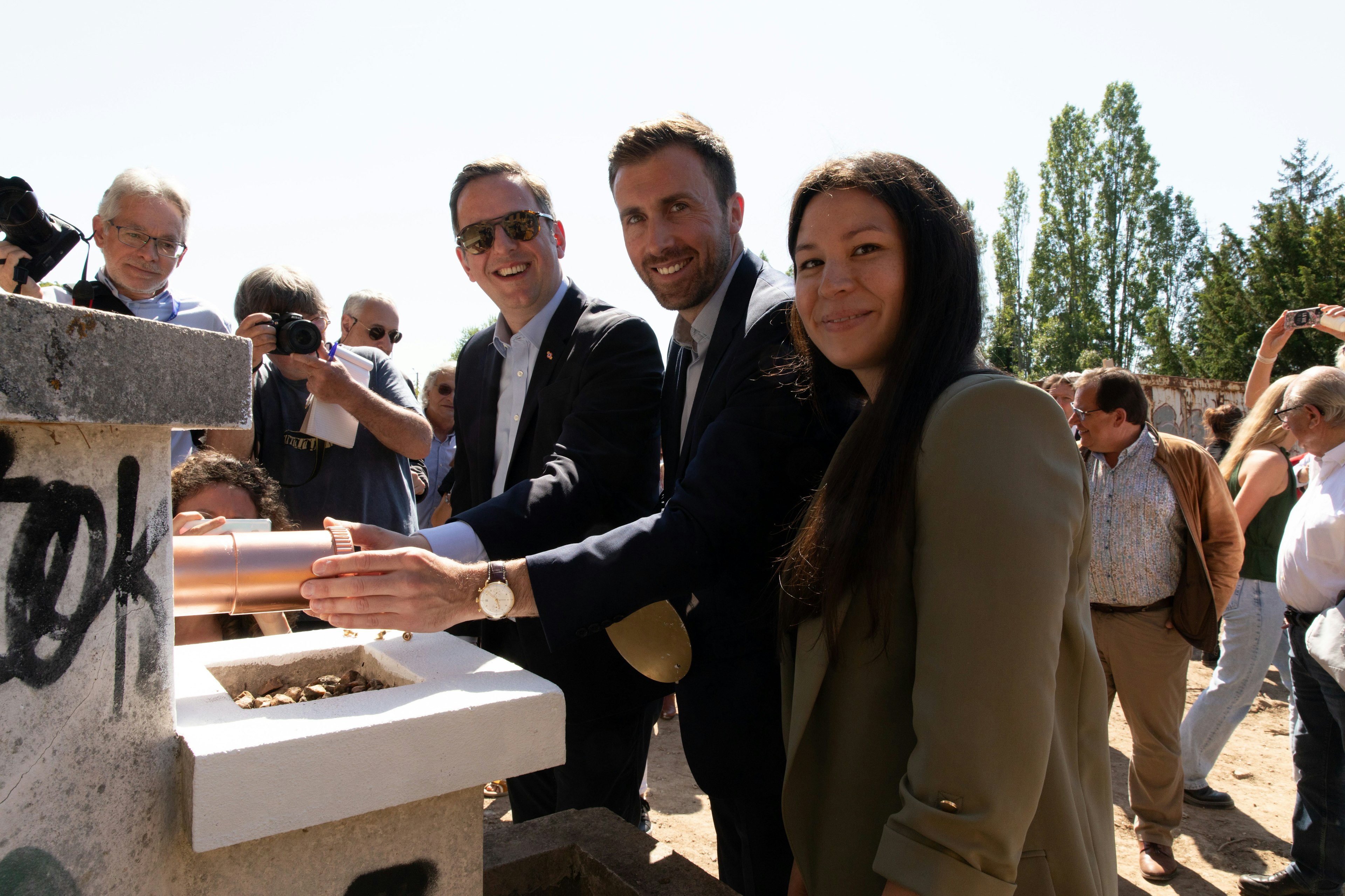 glasses, wristwatch, finger, person, shoe, camera, adult, female, woman, man