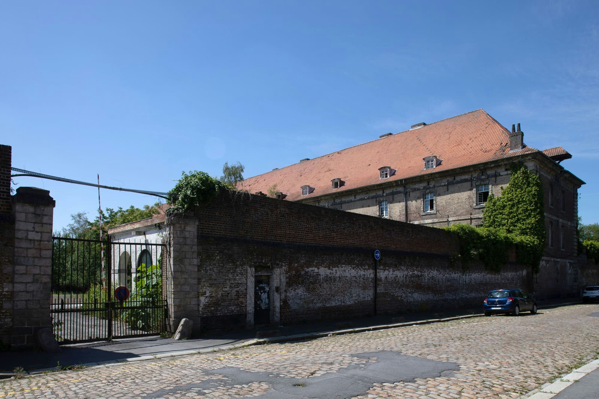 path, road, cobblestone, walkway, gate, car, vehicle, street, urban, housing
