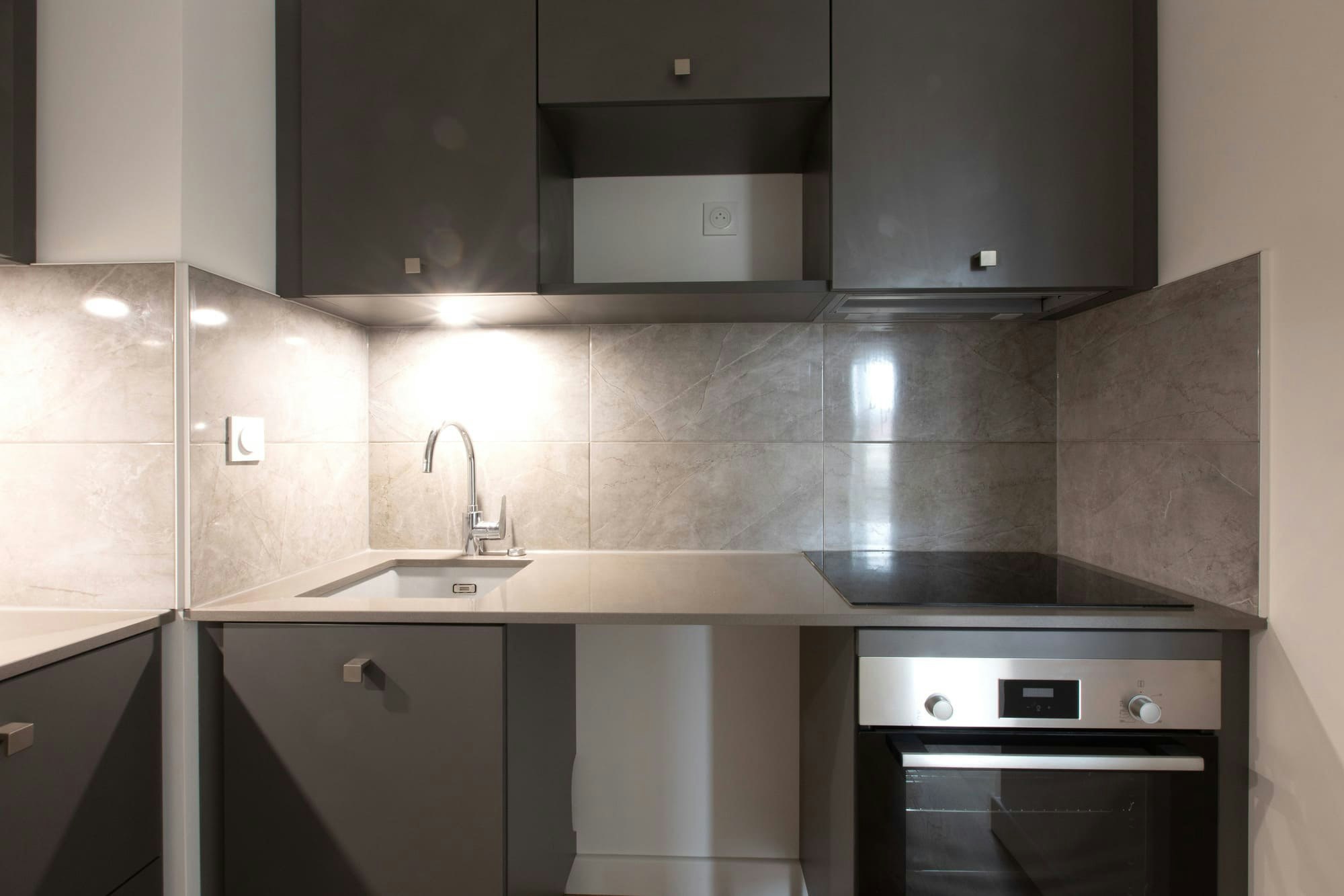 sink, sink faucet, indoors, interior design, kitchen, cooktop, device, electrical device, microwave, oven