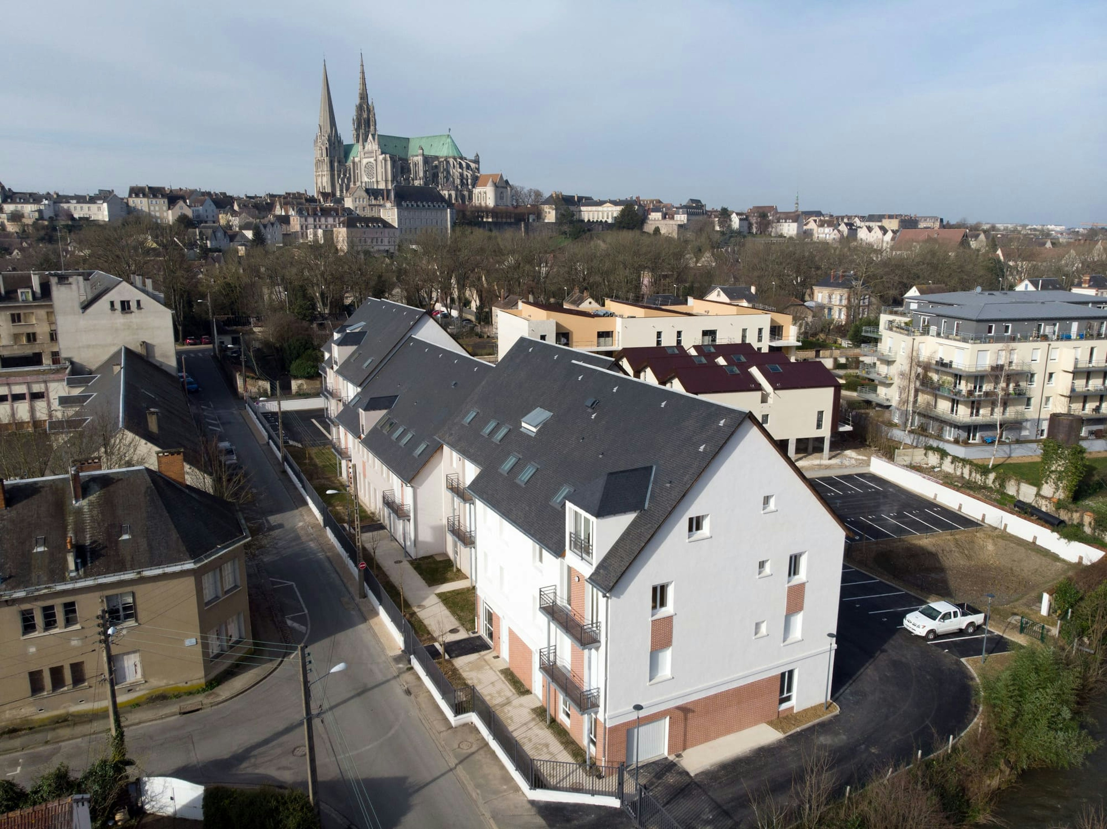 architecture, building, outdoors, cityscape, urban, road, housing, aerial view, city, house