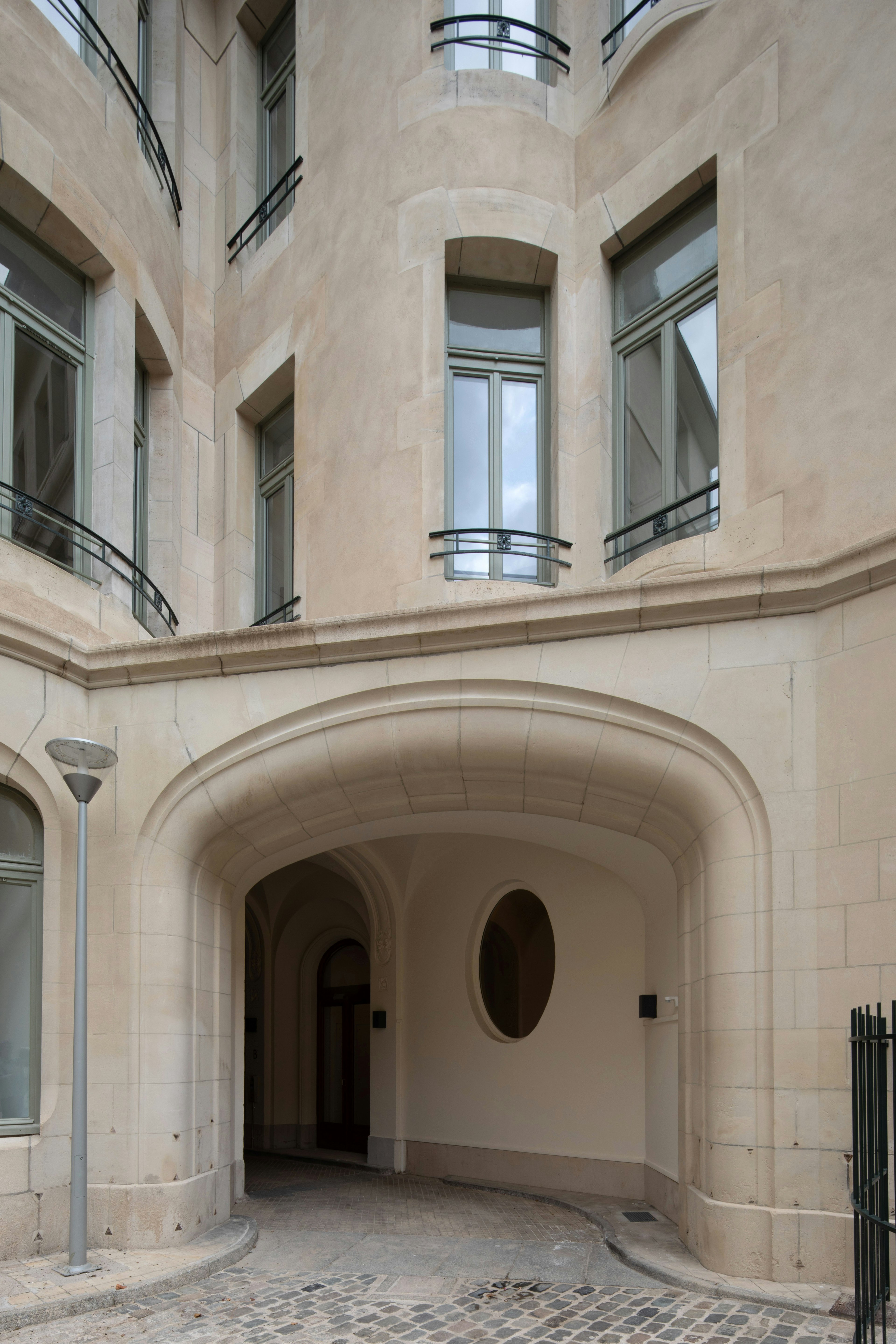 arch, city, floor, handrail, urban, path, flooring, window, indoors, building