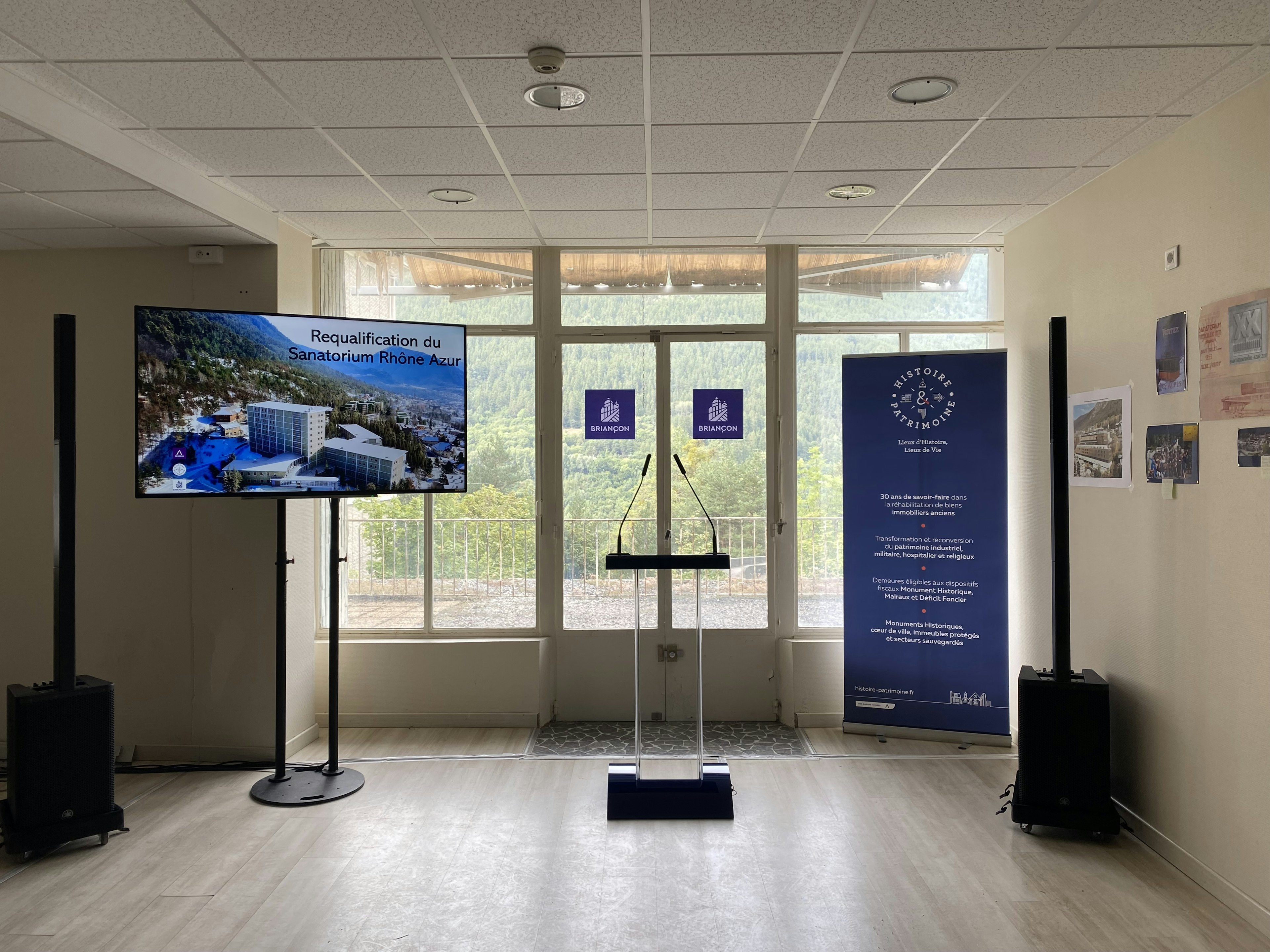 furniture, table, electronics, screen, desk, computer hardware, hardware, monitor, tv, person