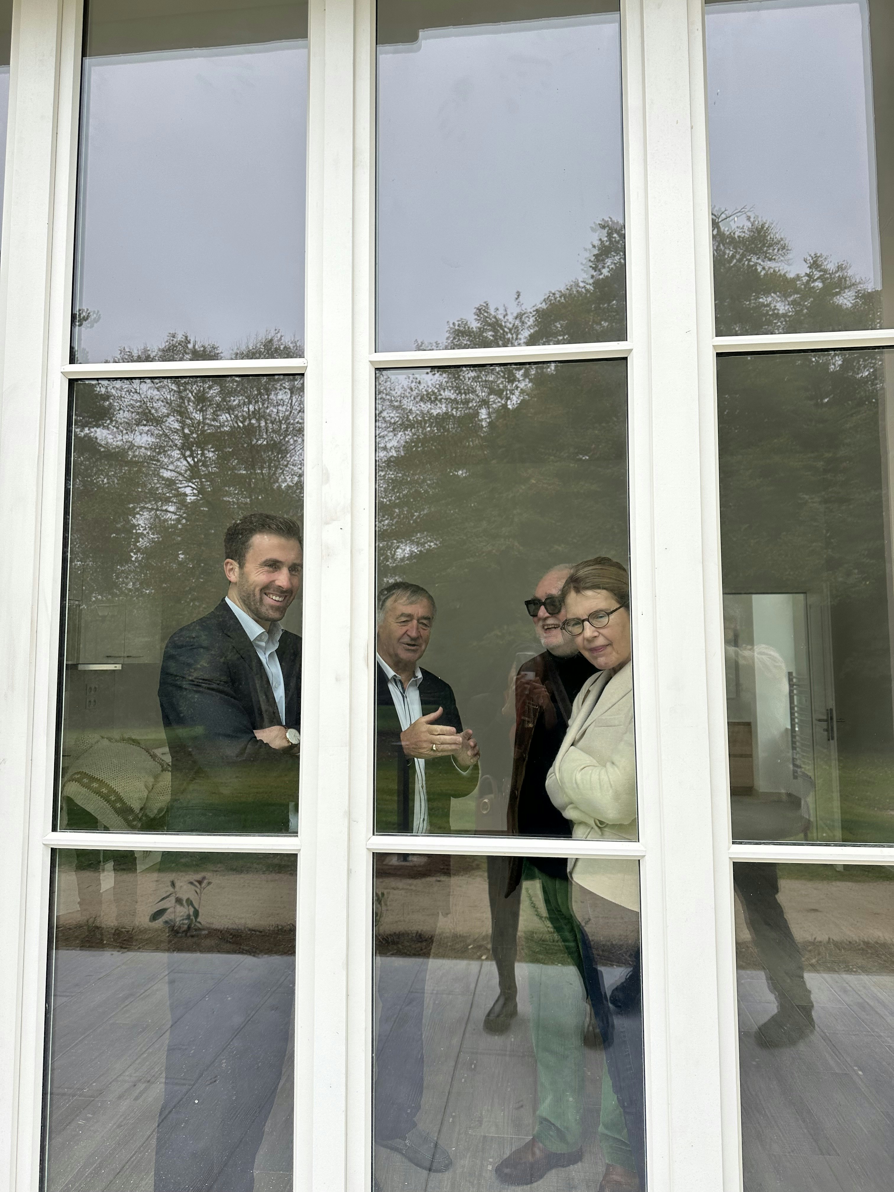 door, coat, jacket, glasses, blazer, shoe, sliding door, adult, man, person