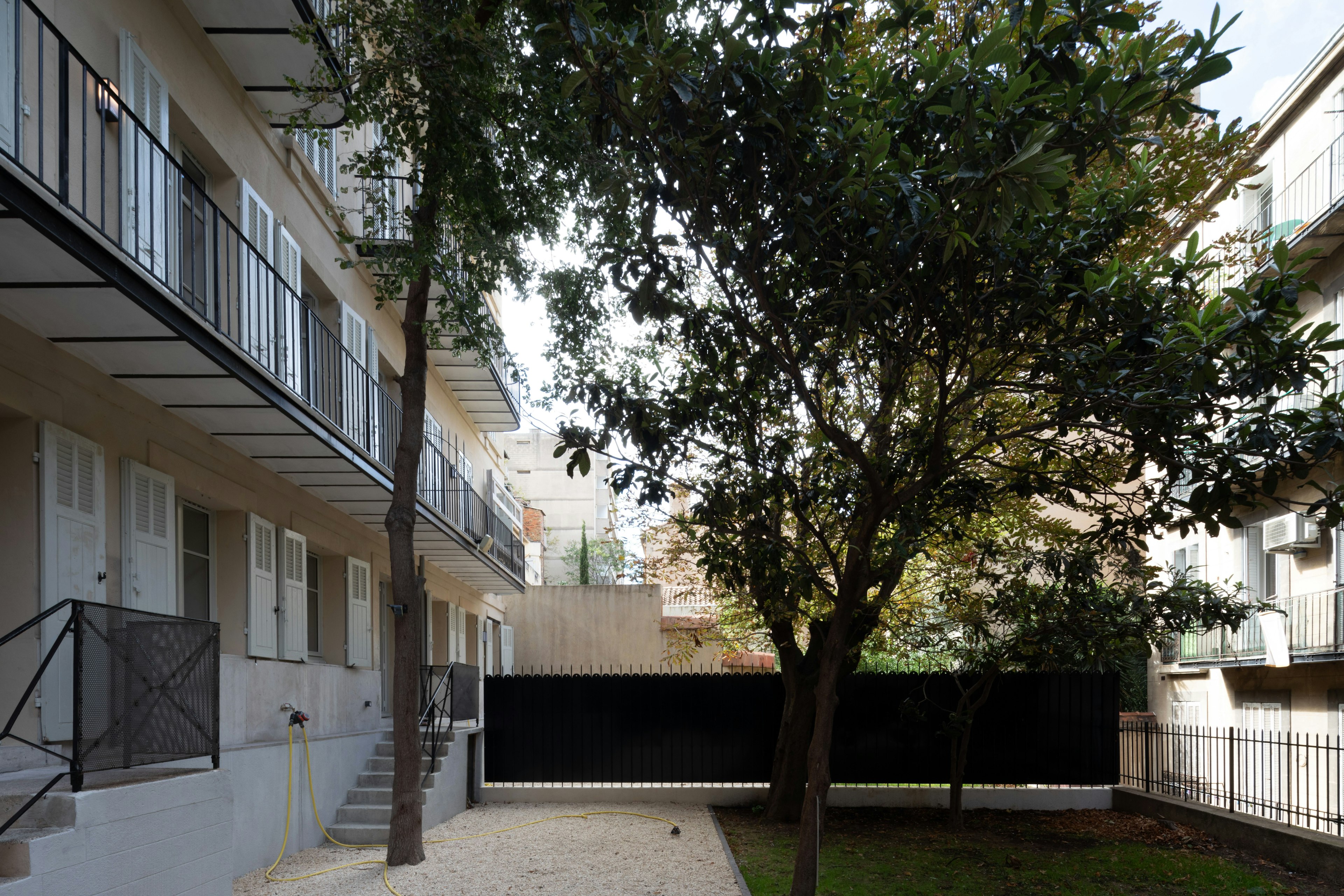 handrail, city, railing, neighborhood, urban, tree, housing, staircase, walkway, street