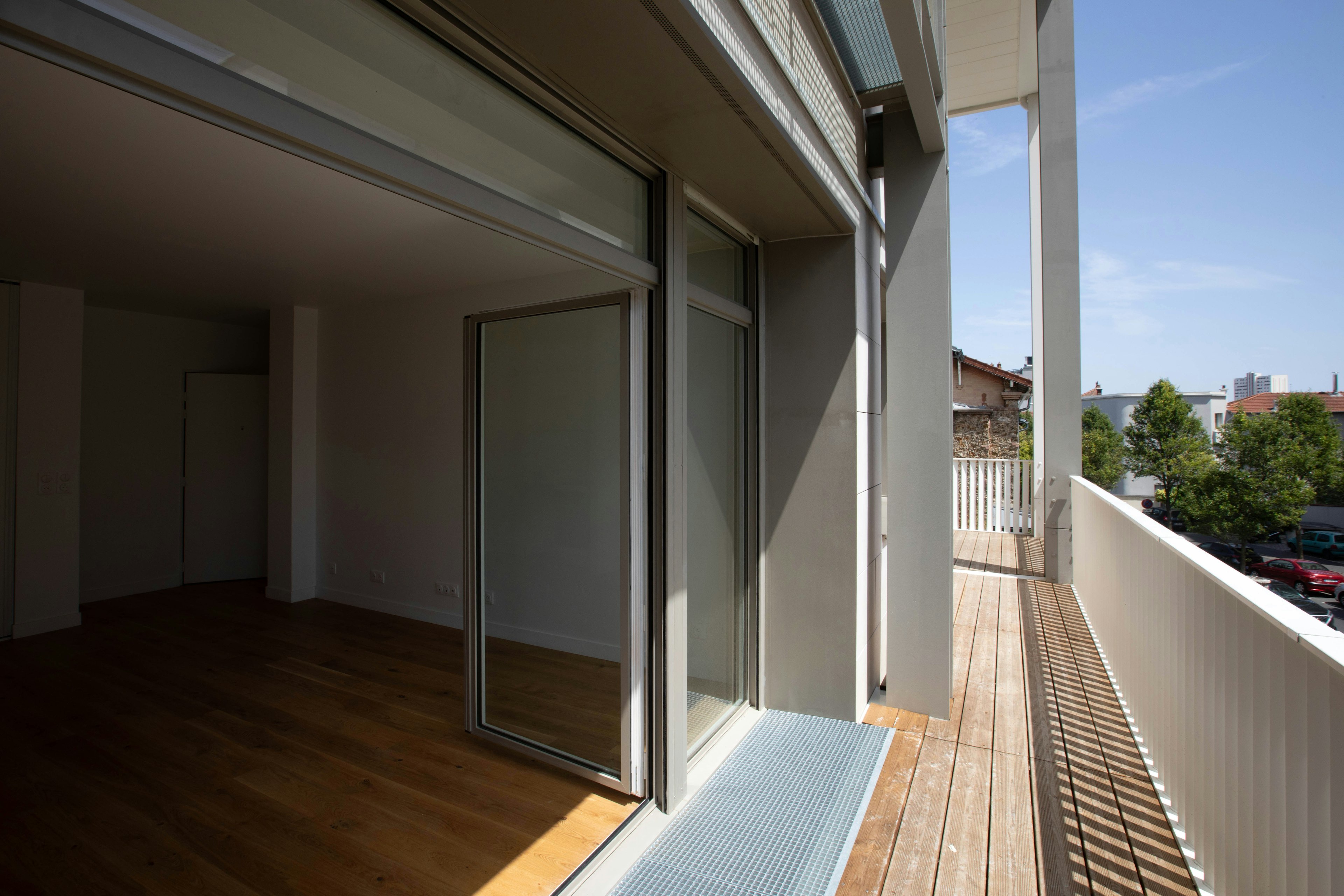 architecture, balcony, building, door, indoors, interior design, car, vehicle, floor, flooring