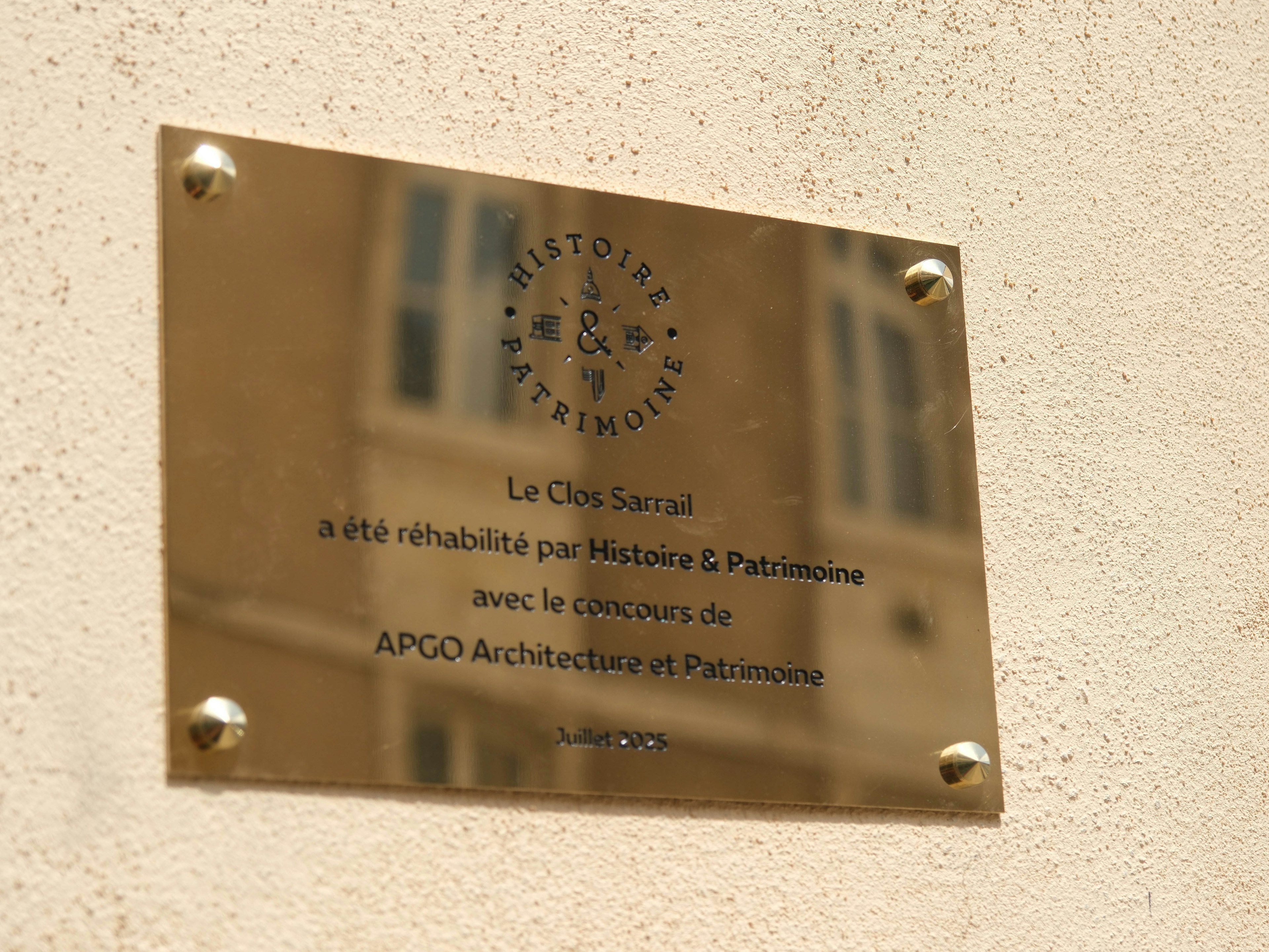 plaque, business card, paper, text