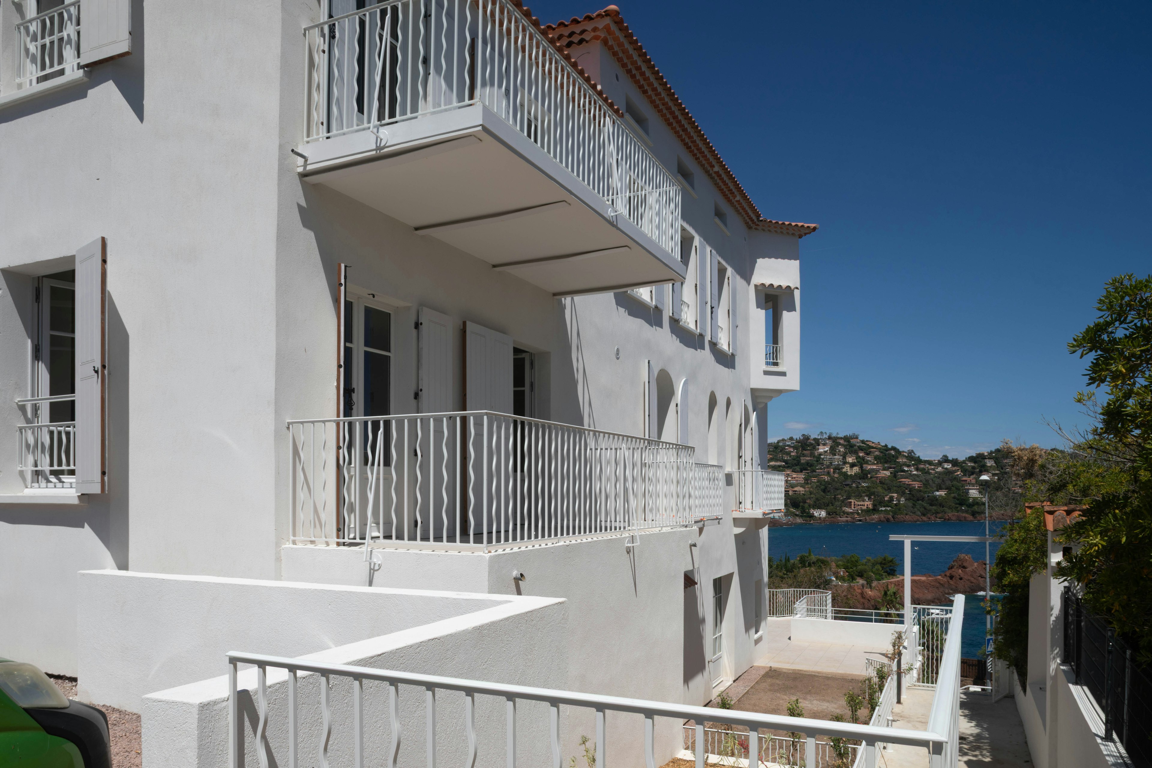 architecture, balcony, building, handrail, housing, villa, city, car, vehicle, condo