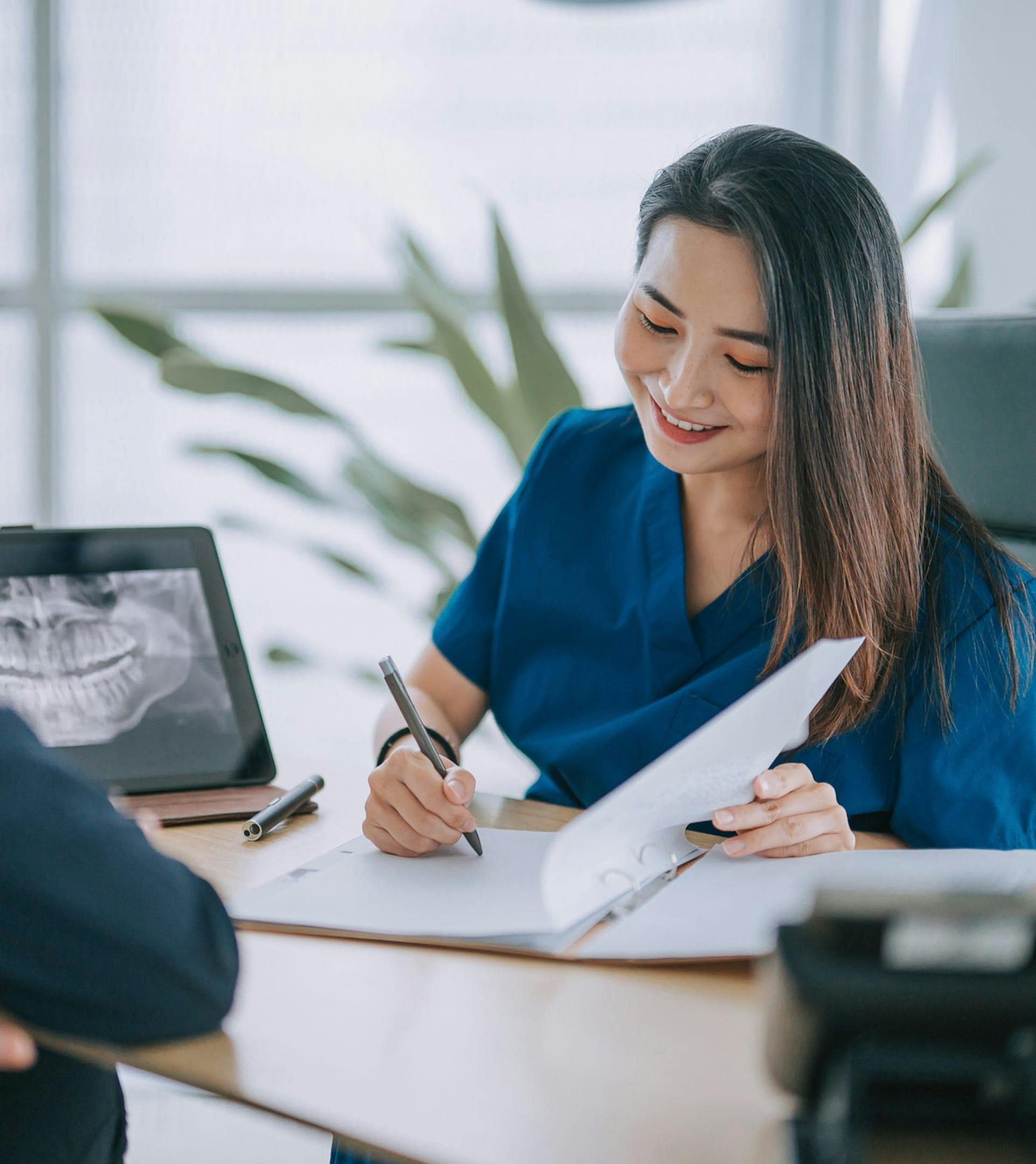 woman working on paperwork