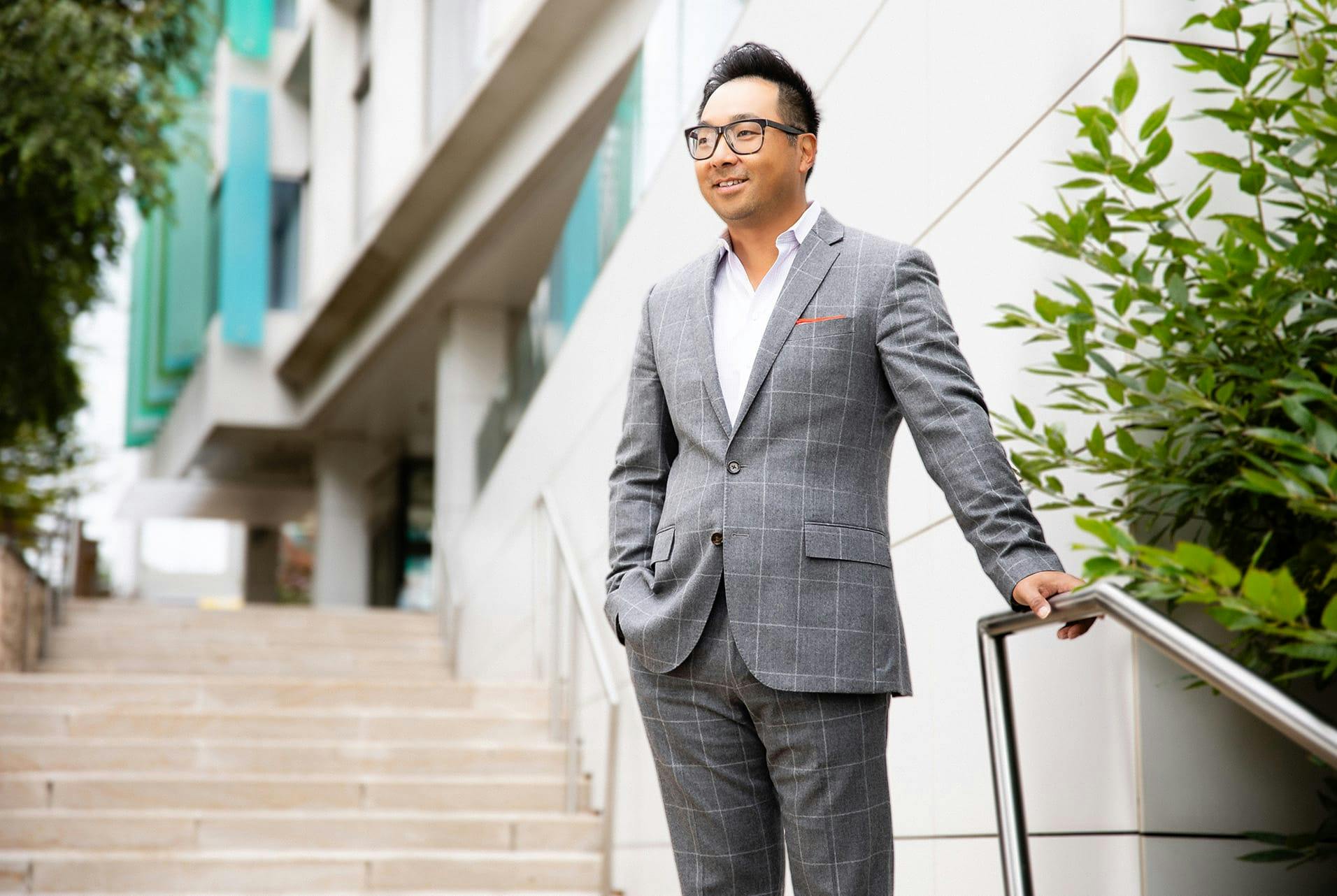 Dr. Robin Yang standing on stairs