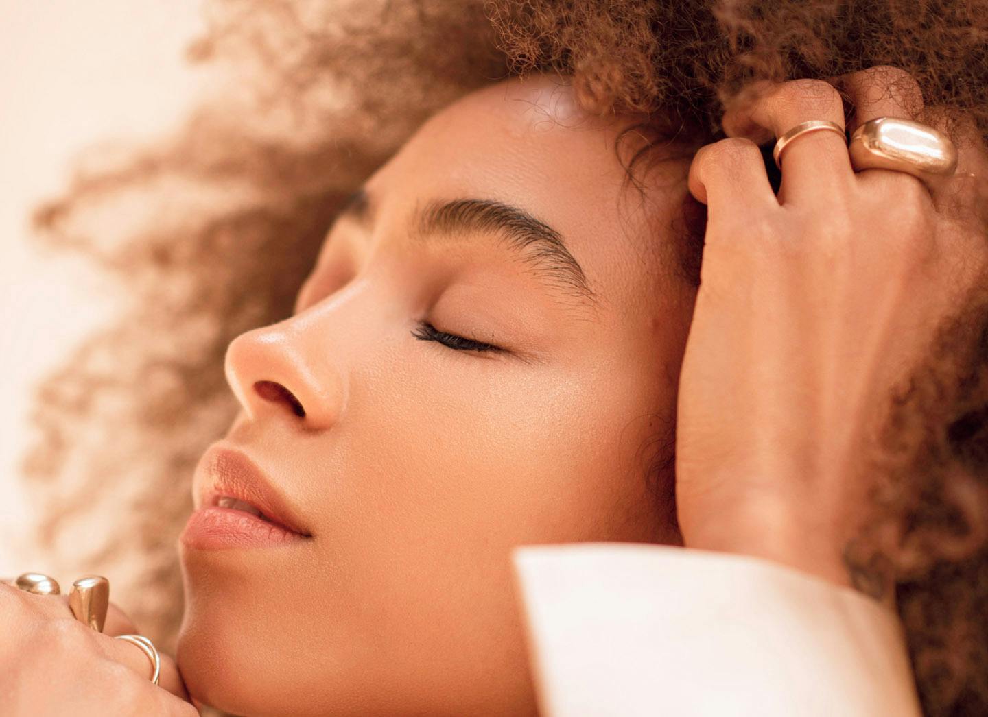 Woman with her hand in her hair