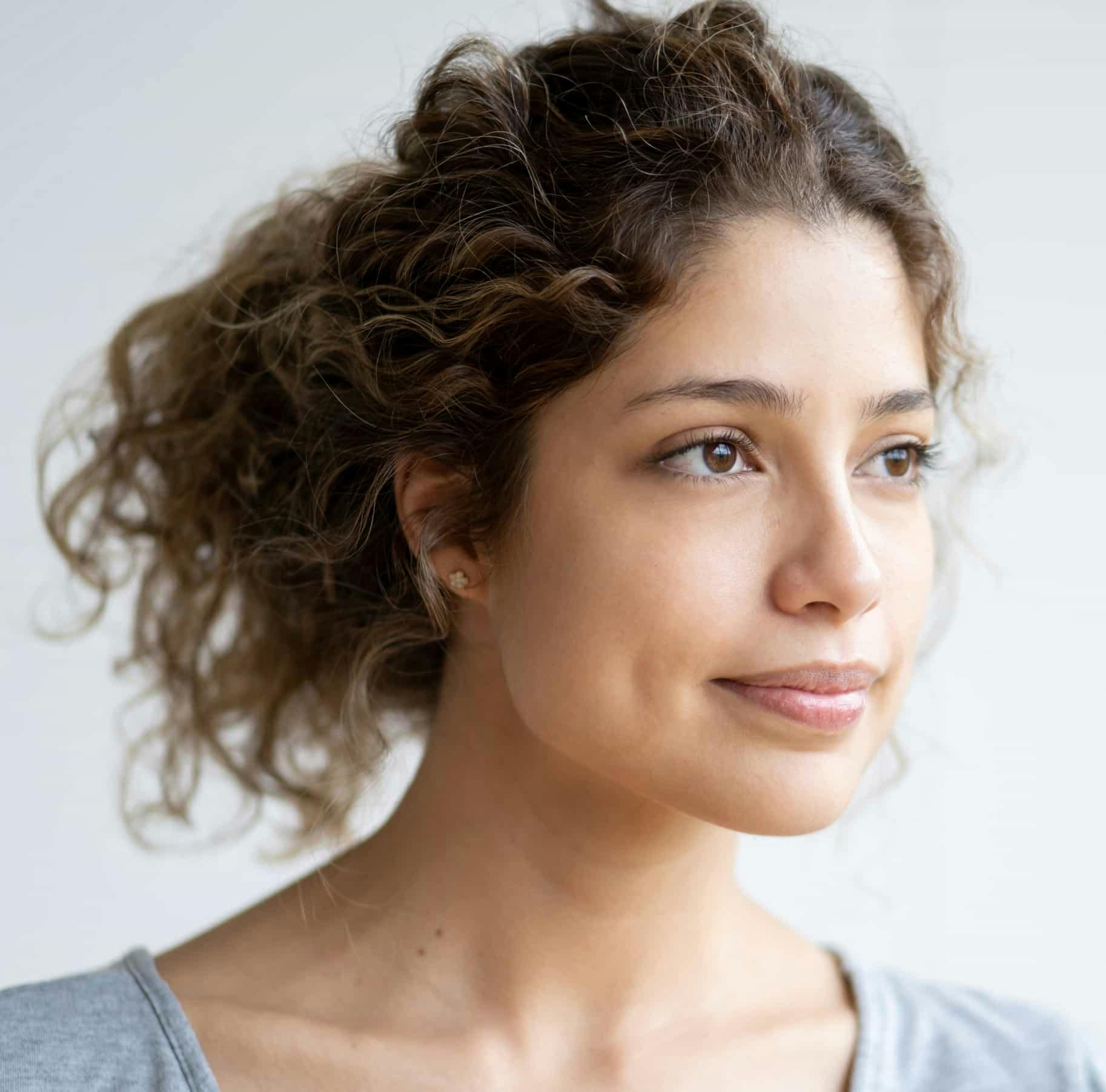 Woman with curly brown hair
