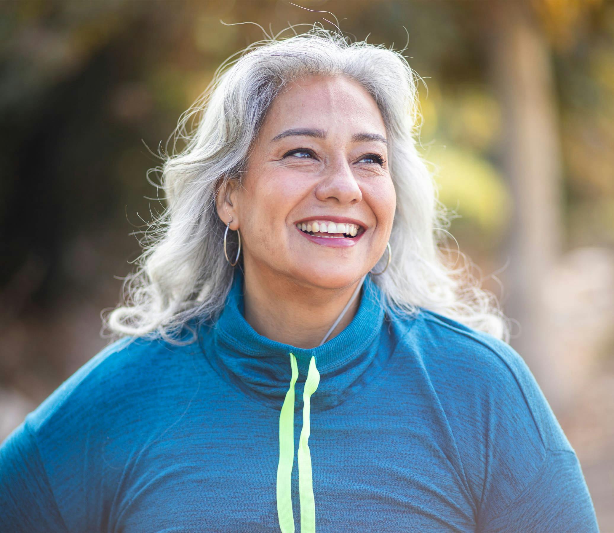 woman with grey hair outside