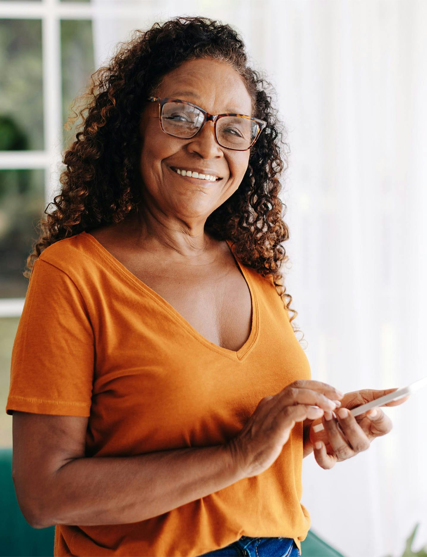 Woman with glasses smiling