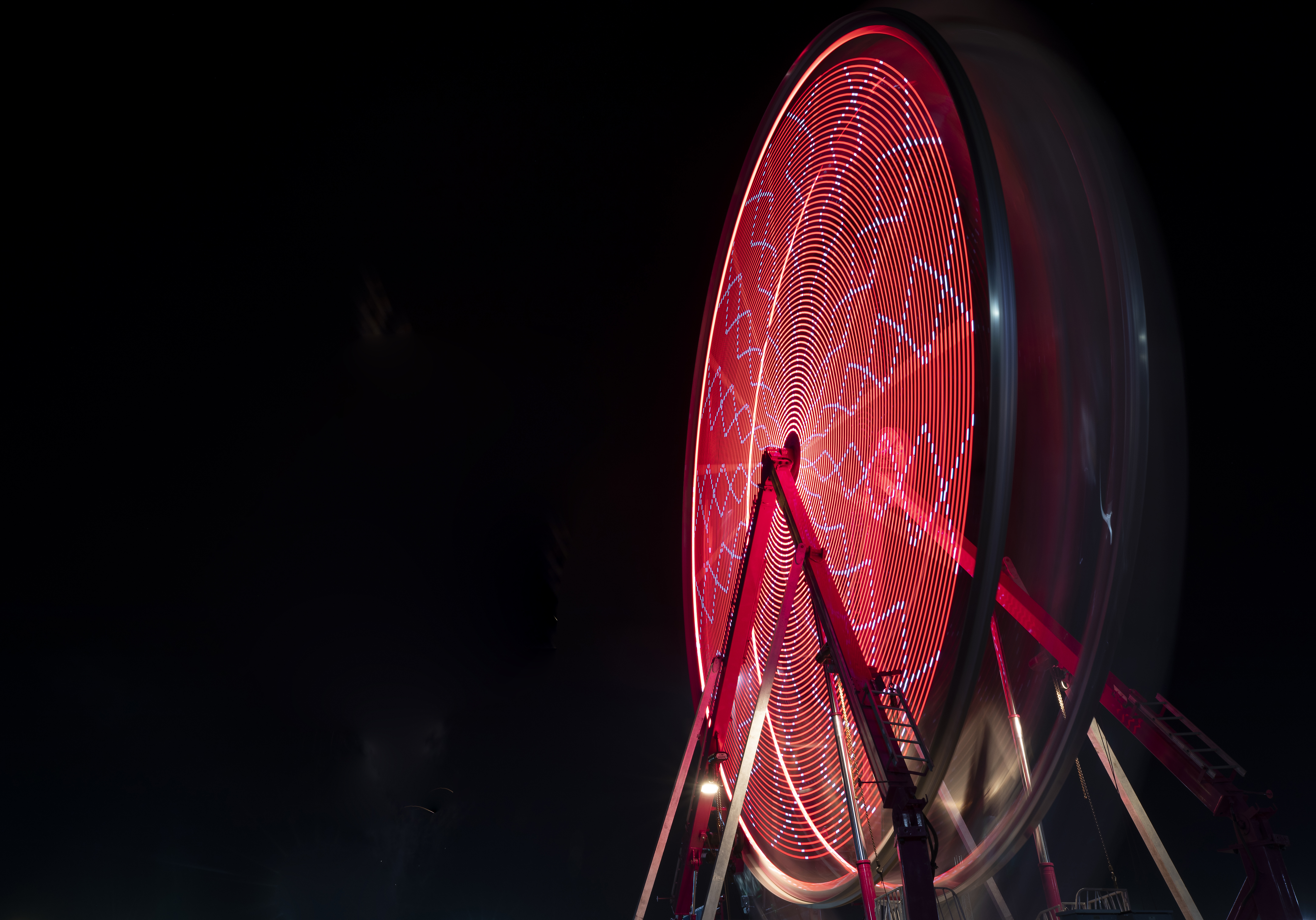 The Wonder wheel ride at night with red lights