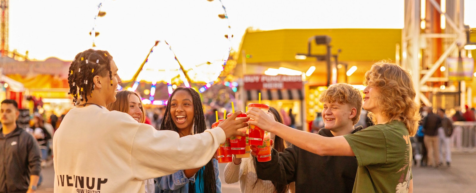 group of teens cheers