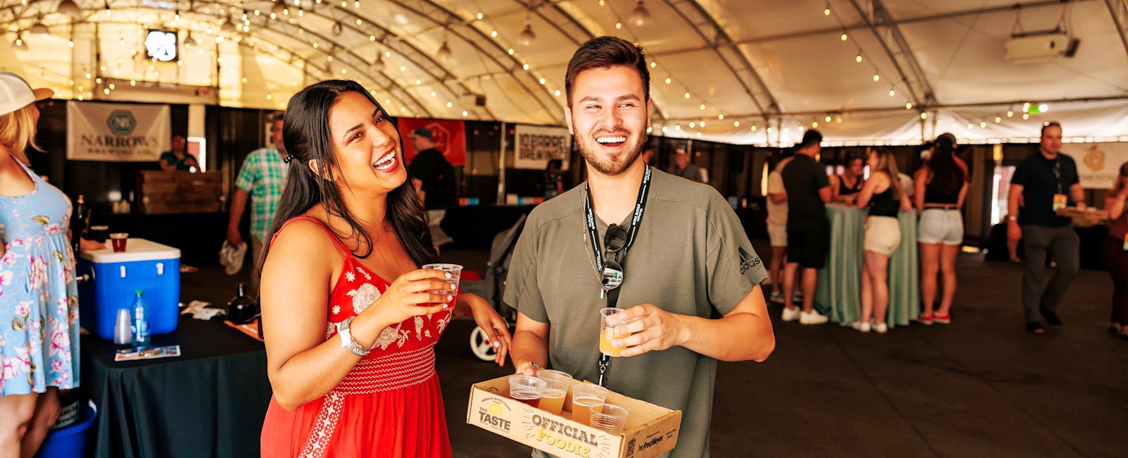 Couple enjoying craft beer & cider tasting