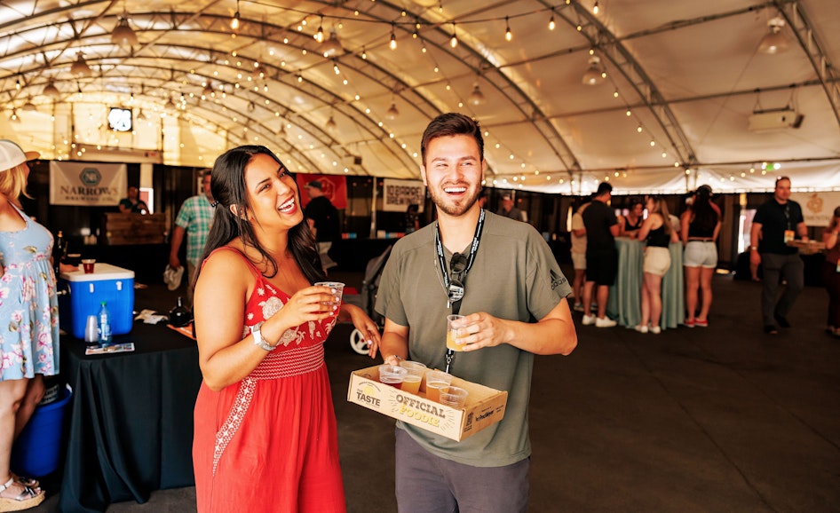 Couple enjoying craft beer & cider tasting