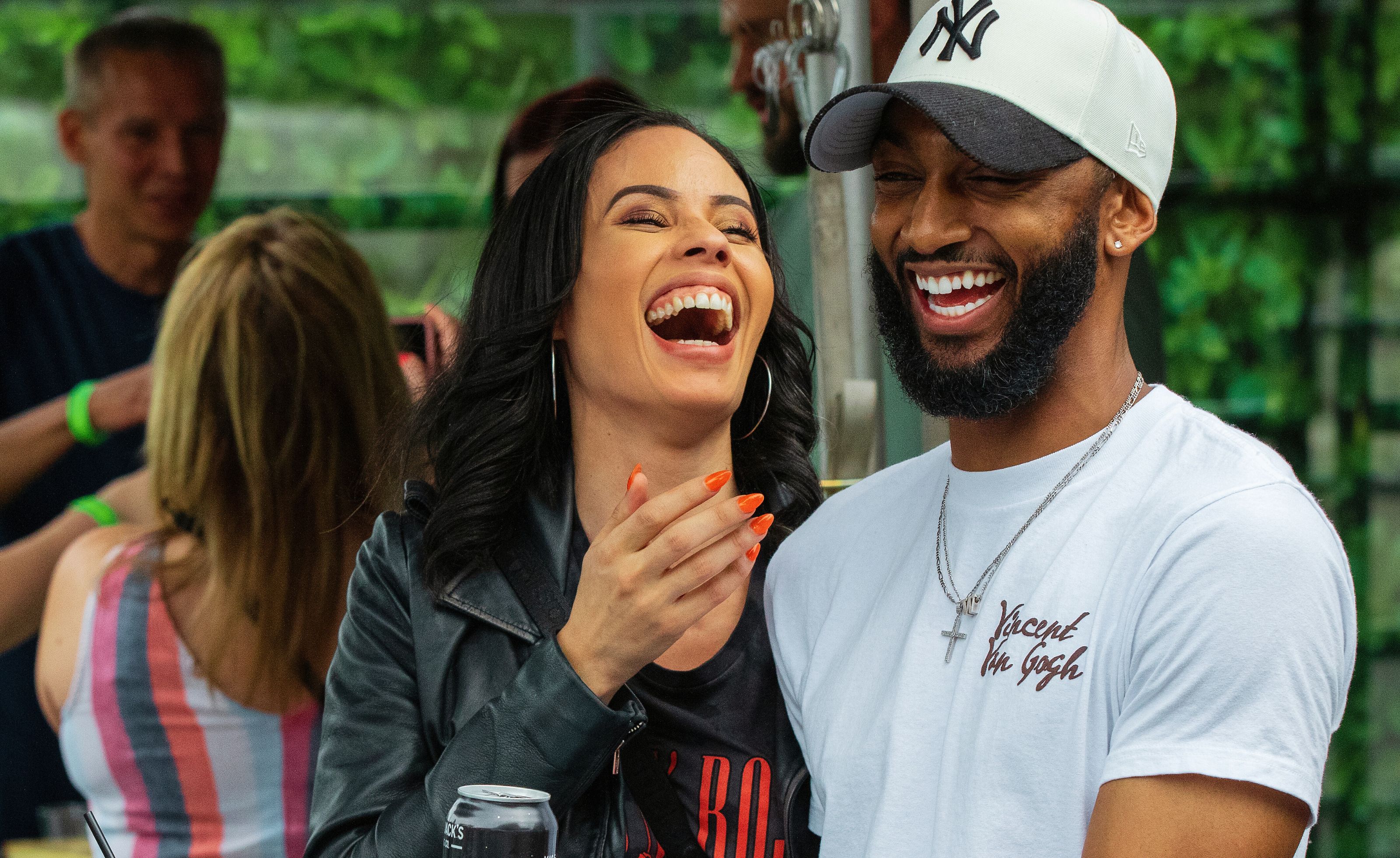 A couple laughing at the Taste NW