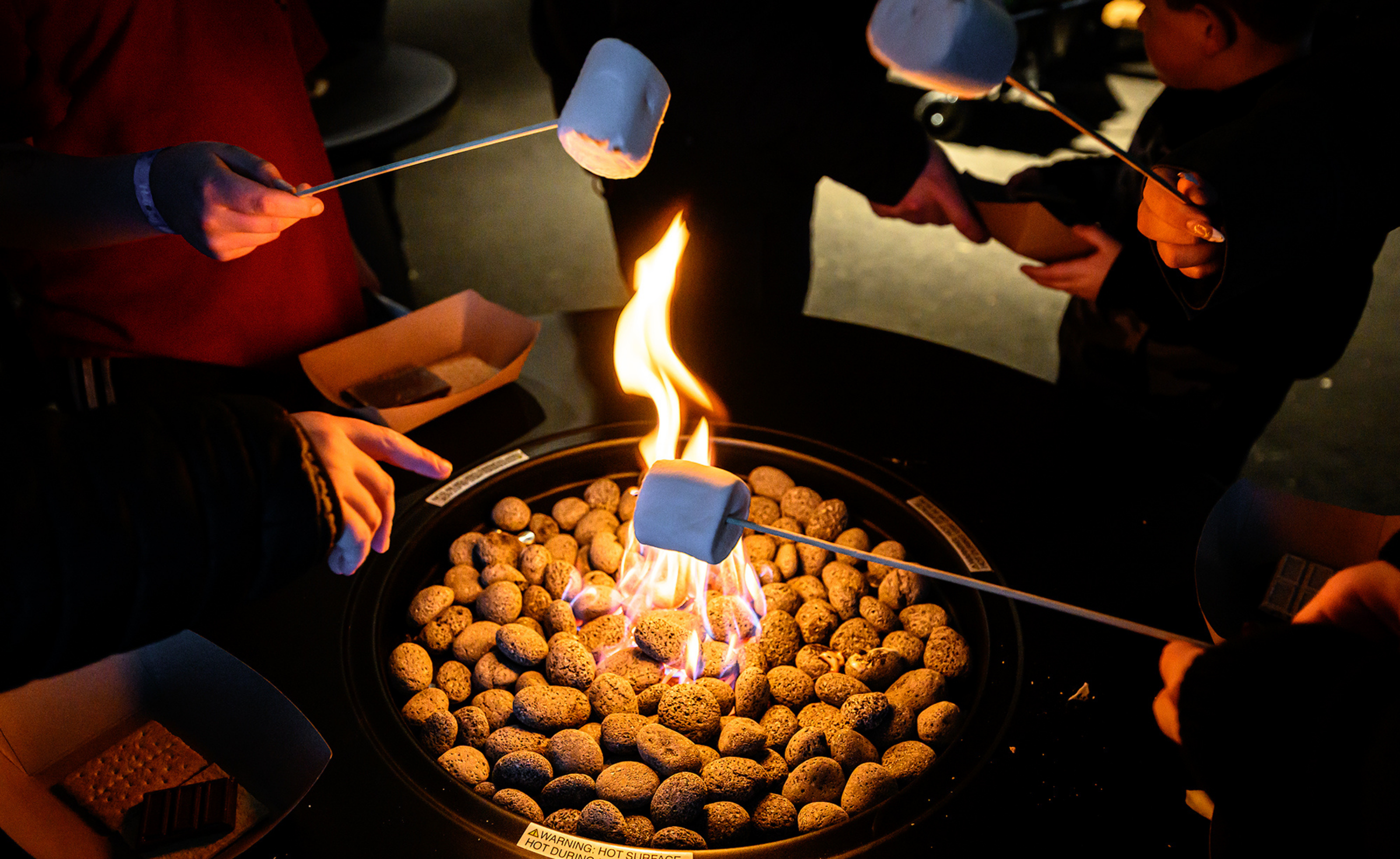 marshmellow roasting at the s'mores bar
