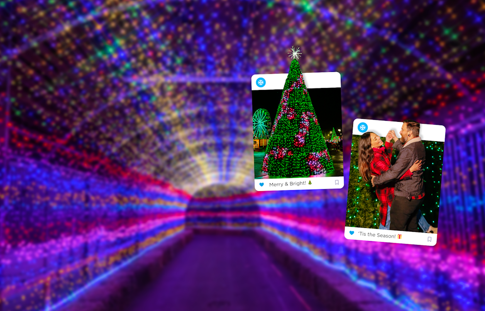 A twinkle light tunnel with instagram frames laid over the top with a large christmas tree and a couple dancing in front of it.