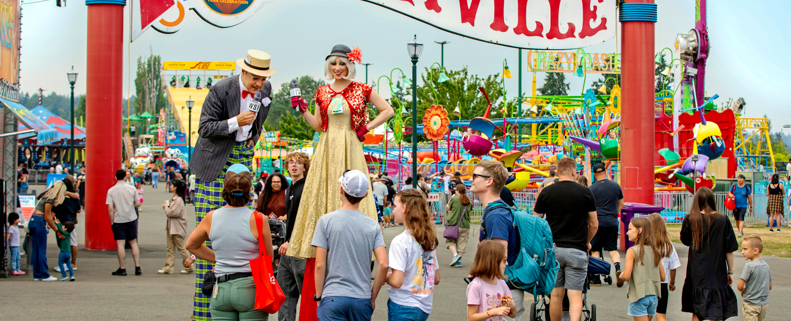 Sillyville Sign with guests around entertainers