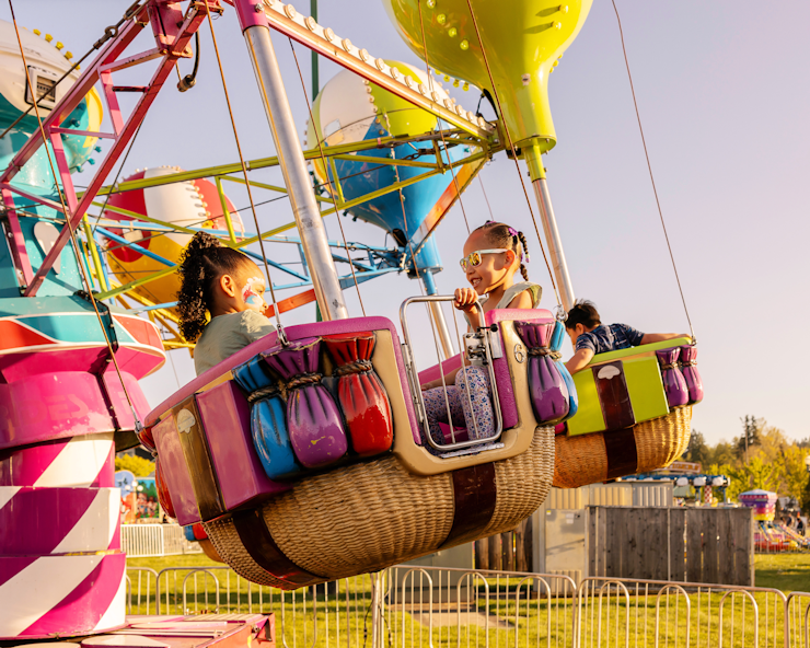Two girls on a ride in SillyVille